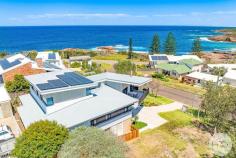 6 Coryule Street Boat Harbour NSW 2316 $3,250,000 A striking example of contemporary coastal design, this exceptional residence captures breathtaking ocean and headland views while delivering an effortless, beachside lifestyle just moments from the sand. Thoughtfully crafted with architectural precision, the home showcases refined materials, natural textures and seamless indoor outdoor living across multiple levels. The main living zone is both impressive and inviting, featuring polished concrete floors, dramatic timber lined ceilings and expansive picture windows that frame the ocean beyond. Open plan living and dining flow effortlessly into the designer kitchen, where sleek black cabinetry, stone benchtops and quality appliances create a functional yet visually stunning space. Large glass sliders and servery style windows connect the interior to a covered balcony, providing a perfect setting for alfresco dining while enjoying cooling sea breezes and coastal outlooks that Boat Harbour provides. A wood fireplace adds warmth and atmosphere, making this space equally appealing year round. Accommodation comprises of four generous bedrooms, three beautifully finished bathroom and a study. The master suite is a true retreat, featuring a bespoke walk in wardrobe, luxurious ensuite and tranquil outlooks. Three stylish bathrooms showcase contemporary fixtures, natural tones and high quality finishes throughout. Additional highlights include a versatile layout across levels, excellent natural light, quality joinery, and secure parking for two vehicles with internal access. Landscaped surrounds enhance privacy while maintaining a relaxed coastal feel. Positioned in one of Port Stephen's most tightly held beachside enclaves, this outstanding home is approximately 150m to Kingsley Beach, 300m to Boat Harbour Beach, placing swimming, coastal walks and breathtaking shoreline scenery right at your doorstep. Featuring: - Four spacious bedrooms plus two work-from-home spaces - Three designer bathrooms with premium finishes - Architecturally designed open plan living with timber ceilings - Statement kitchen with stone benchtops and quality appliances - Covered ocean view balcony ideal for entertaining - Wood fireplace and polished concrete floors - Seamless indoor outdoor connection via large glazing - Massive double carport at the front with lock up storage - Rear lane access with lock up garaging - Separate gymnasium or kids rumpus room Location: - Approx. 150m to Kingsley Beach - Approx. 300m to Boat Harbour Beach - Approx. 2km to One Mile Beach - Approx. 4km to Anna Bay Shops - Approx. 9km to Salamander Bay Shopping Centre A rare opportunity to secure an architecturally designed coastal home where lifestyle, location and design come together in perfect harmony.
