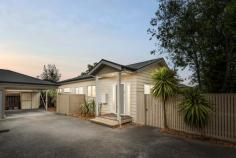 59A Orwil Street Frankston VIC 3199 $550,000 - $605,000 Bathed in a secluded in a north-facing orientation, this charming single-level villa stands as an ideal entry point or a secure investment, strategically positioned amidst the plethora of Frankston amenities. As one of only two on the block, this peaceful three-bedroom retreat features an off-street position, perfectly suited for those seeking a low-maintenance lifestyle while maintaining an enviable sense of accessibility. A single-level configuration is drenched in natural light, opening to an inviting social hub framed by elevated ceilings and a series of sliding doors. Keeping life easy, an adjoining kitchen boasts stainless steel appliances, dishwasher, and a breakfast bar, perfect for everyday functionality and small-scale hosting. With a private outdoor patio, three robed-bedrooms, and a family bathroom with separate shower and tub, the home ticks all the boxes with split-system heating and cooling, a secure grassy play space, garden shed, and an oversized single carport. Positioned within walking distance to Frankston Train Station, Bayside Shopping Centre, Frankston Beach, and public transport.