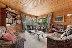 18 Balmerino Square Frankston VIC 3199 $980,000 - $1,060,000 Set in a serene, tree-lined court in Frankston, this expansive double-storey home is designed for growing families, multi-generational living, or anyone who craves space, character, and flexible entertaining. With three generously sized bedrooms, a dedicated home office or fifth bedroom, and multiple indoor and outdoor living zones, it seamlessly combines warmth, charm, and functionality across a sprawling layout. At the heart of the home, the kitchen offers a five-burner gas cooktop, wall-mounted oven, double sink, breakfast bar, and garden-view window, ideal for home cooks or entertainers. Adjacent to the kitchen, the dining room glows under a skylight and includes a feature bar, perfect for hosting family and friends. The large vaulted family room and separate lounge showcase beautiful wood detailing, slate tiling, and natural light streaming through oversized windows. The upstairs master suite is a true retreat with private balcony access, walk-in robe, air conditioning, and a spacious ensuite with double vanity and oversized shower. Downstairs, three additional bedrooms include built-in robes, mirrored storage, timber floors, and garden outlooks, while a stylish main bathroom features a freestanding tub, rainfall shower, and quality fixtures. The separate home office with built-in robe and window is ideal for remote workers or quiet study. Outside, the property unfolds into beautifully landscaped gardens with multiple alfresco options. Enjoy outdoor meals under the covered patio, relax in the central BBQ courtyard, or retreat to the private sauna for an end-of-day escape. A stone pathway winds through lush garden beds and mature greenery, adding a tranquil feel throughout. Practicality is covered with a full-size laundry, split system air conditioning, double carport, two sheds (including a cubby-style space), and a large rumpus/games room that connects to both the front and rear of the property. Situated within easy reach of local schools, parks, shopping precincts and transport, this unique property delivers a rare blend of charm, scale, and indoor-outdoor lifestyle in a tightly held Frankston pocket.