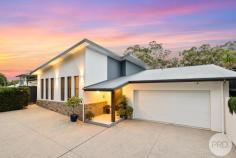 342 Wanda Avenue Salamander Bay NSW 2317 $2,900,000 to $3,100,000 Commanding an elevated position in one of Salamander Bay's most tightly held addresses, 342 Wanda Avenue is a masterfully executed, single level residence that delivers architectural presence, refined coastal luxury and breathtaking outlooks across the bay to Jimmy's Beach and the surrounding Wanda bushland. Built just eight years ago, the home presents as virtually new - timeless in design, impeccably maintained and completely move in ready. From its crisp modern façade to the resort style courtyard and pool, every element has been thoughtfully curated to balance striking architectural form with everyday comfort and functionality. At the heart of the home is an expansive open plan kitchen combined with dining and living areas that are crowned by soaring 6.5-metre ceilings - together, these areas create a dramatic sense of scale, light and volume. Floor to ceiling glazing frames the elevated coastal outlook. Wide sliding doors extend the living space, drawing the majestic 180 degree bay view spectacle indoors. The adjacent 50sqm covered alfresco deck provides an exceptional setting for entertaining, dining or simply unwinding while taking in the uninterrupted views that can be enjoyed from virtually every room. The custom designed chef's kitchen is both visually bold and highly functional, featuring fully integrated appliances including dual dishwashers, integrated fridge-freezer, wall mounted ovens, induction cooktop, wine fridge, Zip filtered water system and a generous walk in pantry. Designed for effortless entertaining, this is a kitchen where form and function work seamlessly together. Luxury continues throughout the home's bathrooms, finished with marble vanities, bespoke cabinetry, heated towel rails and underfloor heating, while the extensive use of premium natural materials - including hardwood flooring, pure wool carpets, limestone tiled bathrooms and granite tiled outdoor entertaining and pool surrounds - create a warm, refined and cohesive aesthetic. Privately positioned and beautifully sheltered, the sun drenched courtyard forms a true resort style retreat. The fully tiled in ground swimming pool, complete with in floor cleaning system and granite surrounds, is framed by clean architectural lines and glass balustrading. A perfect environment for relaxed summer living and entertaining. Completing the home is a premium electrical fit out featuring statement chandeliers, wall sconces and soft touch, electronically labelled switches - a subtle but powerful reminder that this is a residence where quality is evident in both the grand gestures and the finest details. Rarely does a single level home of this calibre, outlook and architectural quality become available - particularly one so young, sophisticated and entirely ready to enjoy. This is coastal living at its most refined. Take our word for it… you are likely to fall in love with this property the moment you walk through the front door. Property Features: - Modern single level residence, only 8 years since built - Elevated bay views extending to Jimmy's Beach and Wanda bushland - Spectacular open plan kitchen, dining and family zone with 6.5m ceilings - Expansive 50sqm alfresco deck ideal for entertaining - Custom chef's kitchen with: . Integrated fridge-freezer . Two integrated dishwashers . Wall mounted ovens . Smeg Induction cooktop . Wine fridge . Zip water filtration . Walk in pantry Extensive use of premium natural materials including: . Marble benchtops in all wet areas . Hardwood flooring . Pure wool carpets . Granite tiles to outdoor entertaining and pool areas . Limestone tiled bathrooms with underfloor heating . Luxury bathrooms with marble vanities, custom cabinetry and heated towel rails . Fully tiled in ground pool with in-floor cleaning . Sheltered, sun drenched courtyard ideal for year round enjoyment . Premium electrical fit out with chandeliers, wall sconces and soft touch labelled switches Nothing to do - move straight in and enjoy this stunning coastal residence.