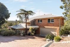 60 Halls Road Helensburgh NSW 2508 Set in a quiet, picturesque pocket with sweeping valley outlooks, this beautifully presented family home sits on an impressive 1,025m² parcel and delivers space, comfort, and lifestyle in equal measure. YOUR HOME • From the moment you enter, this inviting four-bedroom residence feels warm and welcoming, featuring soaring cathedral ceilings, polished hardwood flooring, and abundant natural light throughout. • The clever split-level layout offers multiple indoor and outdoor living zones, providing flexibility for families of all sizes, whether it is cozy evenings by the fireplace or hosting friends on the expansive covered deck. • At the heart of the home, the fully renovated kitchen has been thoughtfully designed for both style and function, complete with Caesarstone benchtops, heated floors, quality appliances, and gas cooking. • The generous main bedroom offers a peaceful retreat, boasting air conditioning, a walk-through wardrobe, and a private ensuite. • An entertainer's delight, the kitchen and dining zones connect effortlessly to the rear deck, capturing breathtaking valley sunsets and enhanced with electric blinds and a ceiling fan, making it the perfect setting for relaxed evenings or hosting friends year-round. • Just off the deck, a landscaped patio overlooks the backyard and provides the perfect spot to enjoy a morning coffee or unwind with a glass of wine. • Winter becomes something to look forward to, with a combustion fireplace creating a warm, inviting ambience throughout the home, perfectly complemented by reverse-cycle air conditioning for year-round comfort. • Those working remotely will appreciate the dedicated, fully fitted home office. • The home also includes a remote double garage with internal access, along with additional off-street parking. • Completing the package, the property benefits from rear lane access and a convenient rear pathway, offering future potential for landscaping, a swimming pool or additional parking, as well as an easy approximately 5-minute walk to Helensburgh train station for effortless commuting. LOCATION • Halls Road is a highly sought after pocket of Helensburgh. This family friendly street has bushwalking trails, the local dog park and train station all only steps from your front door. • Only minutes drive to shops, cafes, restaurants, transport, playgrounds and the free local swimming pool. • Picturesque Stanwell Park Beach is less than 10 minutes away. Enjoy Coastal living without the huge price tag. • This is one of the few remaining areas where a peaceful regional lifestyle meets city convenience, with Sydney's Central Station reachable in under an hour by train. Residents enjoy the charm of small-town living, with bushwalking, swimming holes, bike tracks, sporting clubs, cafés and a friendly community atmosphere. • With Helensburgh's growing popularity, now is the ideal time to secure a home in this family-friendly suburb, just 45 minutes south of Sydney and 30 minutes north of Wollongong.