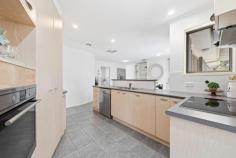 50/121 Streeton Drive Stirling ACT 2611 This single-level freestanding townhouse delivers something rare - genuine family space without the upkeep of a full block. With no direct neighbours on three sides and bushland reserve across the road, it feels more like a standalone home than a townhouse. Freshly painted externally and immaculately presented inside, the home is ready to move straight into. North-facing living areas flood the interior with natural light, while a contemporary gas fireplace anchors the family room - visible from the kitchen, it sets the tone for winter evenings without the hassle of wood. Curved feature walls add architectural character throughout, lifting the home well beyond standard townhouse fare. The layout works for real life. Formal and casual living zones each open to a pergola-covered terrace in the backyard - ideal for weekend entertaining or weeknight dinners that drift outdoors. The kitchen is well-equipped with modern appliances, a coffee station and a full-height double pantry that families will appreciate. A covered pergola walkway guides you from the front yard to the entrance, while a third pergola beside the master and spare bedrooms creates a private outdoor nook with potential for a sheltered garden retreat. All three pergolas have been freshly painted along with the full exterior. Four bedrooms are smartly arranged, with the primary suite tucked to the front of the home for quiet separation from the street. Three additional bedrooms offer flexibility for kids, guests or a dedicated home office. Storage is exceptional - built-in wardrobes, linen cupboards and a large laundry round out the practical details. A double garage plus additional off-street parking makes daily logistics easy, while a secure rear yard provides safe outdoor space for children and pets. Walk to schools, shops and cafes in minutes. Lace up your shoes and you're on Cooleman Ridge soaking in panoramic views before breakfast. This is Stirling living at its most convenient. Single-level freestanding townhouse Freshly painted exterior and three pergolas Immaculately maintained interior North-facing, sun-filled formal and casual living zones Contemporary gas fireplace to family room Curved architectural feature walls Three pergolas: covered entertaining terrace, front entry walkway and private garden pergola Central kitchen with modern appliances, coffee station and full-height double pantry Four bedrooms including primary with ensuite and mirrored wardrobes Built-in wardrobes in all bedrooms Ducted heating and evaporative cooling Exceptional storage throughout Large laundry with linen cupboard Double garage Additional off-street parking Secure rear yard with easy-care gardens Adjacent to bush reserve and Stirling playing fields Walking distance to schools, shops, cafes and Cooleman Ridge trails