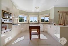 31A Pages Lane Tamworth NSW 2340 $1,000,000-$1,100,000 Set on an expansive 7127sqm parcel of land 31A Pages Lane in Kingswood offers space, versatility and a relaxed lifestyle with plenty of room for the whole family to enjoy. Whether you're chasing space for kids to play, hobbies to pursue or simply room to breathe, this property delivers a rare opportunity in a peaceful setting. The home is filled with natural light thanks to large windows throughout creating a warm and inviting atmosphere. A sunroom provides valuable additional living space and is fitted with a ceiling fan, making it ideal for year-round use. The master bedroom is well positioned and features a walk-in robe and ensuite, while the remaining three bedrooms are all fitted with built-in wardrobes. Storage and workspace are a standout feature, with a double garage shed offering extra room ideal for a workshop, along with a large rear shed perfect for housing a boat, caravan or additional storage. Combining generous land size, functional living and excellent shedding, this Kingswood property offers space and flexibility rarely found.