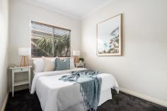 59A Orwil Street Frankston VIC 3199 $550,000 - $605,000 Bathed in a secluded in a north-facing orientation, this charming single-level villa stands as an ideal entry point or a secure investment, strategically positioned amidst the plethora of Frankston amenities. As one of only two on the block, this peaceful three-bedroom retreat features an off-street position, perfectly suited for those seeking a low-maintenance lifestyle while maintaining an enviable sense of accessibility. A single-level configuration is drenched in natural light, opening to an inviting social hub framed by elevated ceilings and a series of sliding doors. Keeping life easy, an adjoining kitchen boasts stainless steel appliances, dishwasher, and a breakfast bar, perfect for everyday functionality and small-scale hosting. With a private outdoor patio, three robed-bedrooms, and a family bathroom with separate shower and tub, the home ticks all the boxes with split-system heating and cooling, a secure grassy play space, garden shed, and an oversized single carport. Positioned within walking distance to Frankston Train Station, Bayside Shopping Centre, Frankston Beach, and public transport.