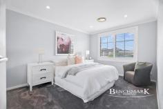 237 Epsom Road CHIPPING NORTON NSW 2170 Perfectly positioned in a desirable pocket of Chipping Norton, this beautifully presented four-bedroom home offers space, flexibility and modern updates — ideal for first home buyers, growing families or investors seeking a quality property in a family-friendly location. Set on a generous corner block with side access and plenty of street parking, this home delivers both practicality and lifestyle. Downstairs, a versatile room with double doors upon entry provides the flexibility of a fifth bedroom, formal lounge or rumpus room — perfect for larger families or those working from home. Upstairs features four well-proportioned bedrooms, all with built-in wardrobes. The main bedroom is a true retreat, complete with a walk-in robe, additional built-in wardrobe and a beautifully updated ensuite. A separate study upstairs adds further convenience for modern family living. The heart of the home is the updated kitchen, flowing seamlessly into the expansive family living and dining area. Designed for comfort and connection, this space opens directly to a stunning undercover outdoor entertaining area overlooking the sparkling heated in-ground pool — perfect for year-round entertaining and relaxed weekends at home. Both the kitchen and bathrooms have been tastefully renovated, allowing you to simply move in and enjoy. With its corner block position, side access, flexible floorplan and resort-style outdoor area, this is a home that truly ticks every box for young families or investors looking to secure a standout property in Chipping Norton. Disclaimer: Benchmark National Moorebank have taken all care in preparing this information and used their best endeavours to ensure that the information contained is true and accurate at the time of printing.