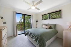 18 / 463 Trees Road Tallebudgera QLD 4228 $1,695,000 Co-existing in complete harmony with its natural wonderland setting, this residence is an stylish, serene and restful retreat. Set within the exclusive Glencairn Estate on a 2395m² block, where peace and privacy are paramount, it also basks in breathtaking vistas that sweep across the hinterland to the majestic Mt Tomewin ranges. Radiating calm and charm across two levels, blackbutt timber floors and high ceilings further amplify the sense of warmth and comfort. Chef's will be inspired to cook up a feast in a kitchen appointed with stainless steel benchtops and 900mm gas cooktop, with the option to enjoy it in the adjoining casual meals area or elegant dining zone. Then, for connection and conversation, retreat to the lounge room crowned by a soaring 4.9m ceiling, with an imported PyroClassic wood heater to curl up by in cooler months. New carpet flows underfoot in the bedrooms, led by a master suite with a built-in robe and contemporary ensuite. Two additional bedrooms with built-in robes are served by a modern bathroom, and one spills onto a balcony to soak in the fresh hinterland air. A bespoke circular staircase leads to a ground level study and versatile multipurpose room with ensuite – ideal for use as a teenage retreat, rumpus or guest quarters. Storage is abundant with under-house and internal storerooms, plus a laundry with an extra powder room ensures convenience. Outdoors, this tranquil haven continues to impress. The wraparound balcony is a sublime spot to savour the ever-changing colours of the valley and hinterland, while the front with built-in bar is a delightful spot to entertain. Lush greenery awaits at every glance too, while beyond your borders, protected council reserves add to its tranquillity and beauty. One of just 19 homes in a secure, gated enclave, you don't have to compromise on convenience. Tallebudgera State School and local shops are just 7 minutes away, St. Andrews Lutheran College is approx. 10 minutes by car, and vibrant Burleigh Heads beaches, boutiques, bars and more beckon in approx. 15 minutes. For those seeking a sanctuary with soul, serenity and seclusion – this is the one you've been waiting for. Inspect today! House Features: Effortlessly stylish, comfortable and charming haven co-existing in complete harmony with the natural habitat Basks in breathtaking vistas that sweep across to the majestic Mt Tomewin ranges Spans two levels, linked by a beautiful handcrafted circular staircase Chef's kitchen, equipped with a 900mm gas cooktop, stainless steel countertop for meal preparation, utensil racks, ample storage, breakfast bar and meals area Vast lounge crowned by a soaring 4.9m ceiling, offset by blackbutt timber floors and an imported PyroClassic Wood heater Dining area opens to balcony, with 3.2m ceiling Master suite with built-in robe and a contemporary ensuite with full-height tiling Two bedrooms with built-in robes; one with balcony access New carpet in all bedrooms Modern main bathroom Versatile multi-purpose room downstairs with ensuite; ideal as a teen retreat, rumpus, or bedroom Ground floor study opens to the outdoors Wraparound balcony basking in panoramic valley and hinterland views Front entertaining deck with built-in bar Laundry with additional powder room Under-house and internal storerooms Double carport Ceiling fans throughout Property Features: 2395m2 block in the gated Glencairn Estate – a secluded and exclusive enclave of just 19 homes Cocooned by council reserves and enriched by a Voluntary Conservation Agreement for Common Ground Driveway parking Lush, established greenery Veggie garden Wastewater system Inground water tank plus connected to town water Location: Approx. 7 mins to Tallebudgera State School and local shops Approx. 10 mins to St. Andrews Lutheran College Approx. 15 mins to Burleigh Heads Approx. 17 mins to Palm Beach Approx. 18 mins to Currumbin Alley Approx. 21 mins to Gold Coast Airport Approx. 36 mins to Surfers Paradise