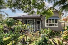 3 Bulgo Road Helensburgh NSW 2508 Solid, stylish and superbly located, this charming character home offers the perfect blend of timeless appeal, modern upgrades and everyday convenience. Set on an easily accessible corner block in a quiet, pocket of town, the home is just a short, level walk to Helensburgh shops, cafes and local amenities, making daily life genuinely easy and enjoyable. The property has been thoughtfully extended and improved, with a major extension completed in 2018 including a new roof. Freshly painted interiors and exterior further enhance the home's move in ready feel, while retaining the warmth and character that make cottage homes so special. Inside, you are welcomed by striking 3.2 metre high decorative ceilings, a fireplace that anchors the living space, and a wonderful sense of quality throughout. The heart of the home is the beautiful kitchen, featuring premium Smeg appliances and Italian stone benchtops, perfectly designed for both everyday living and entertaining. A wrap around verandah extends the living spaces outdoors and provides a lovely outlook across the gardens. All three bedrooms include built in wardrobes, the bathroom features a stunning claw foot bath, and the large internal laundry adds a level of practicality that is often hard to find. Step outside and the lifestyle offering really shines. A covered outdoor entertaining room with built in BBQ overlooks the inground heated salt water swimming pool, creating the perfect setting for relaxed weekends, family gatherings and effortless entertaining year round. The beautifully landscaped gardens add privacy, colour and a strong connection to the outdoors, giving the home a peaceful and established feel. Additional features include ducted air conditioning throughout all rooms, solar panels with a 11kw battery for excellent energy efficiency, and a layout that delivers both comfort and functionality. Solid, stylish and superbly located, this is a quality Helensburgh home offering long term value and an easy lifestyle in one of the area's most convenient and tightly held settings. Property highlights • Charming cottage style three bedroom home on an easily accessible corner block • Quiet location within easy walking distance to shops and local amenities • Extension completed in 2018 including a new roof • Freshly painted interior and exterior • Kitchen with Italian stone benchtops and Smeg appliances • 3.2 metre high decorative ceilings and fireplace • Wrap around verandah with garden outlook • Covered outdoor entertaining room with BBQ and outdoor kitchen • Inground heated salt water swimming pool • Ducted air conditioning to all rooms • Solar panels with 11kw battery • Beautifully landscaped gardens • Location is a major advantage, with Helensburgh Train Station just a short drive away, making it ideal for commuters seeking an easy approximately 50 minute journey into Sydney. • Picturesque Stanwell Park Beach and The Royal National Park are both less than 10 minutes drive away, offering the chance to enjoy a coastal lifestyle without the coastal price tag. This is one of the few remaining areas where you can enjoy a peaceful regional lifestyle less than an hour from Sydney, with all the charm of small town living including bushwalking tracks, swimming holes, bike paths, sporting clubs, cafes and a strong welcoming community.