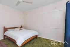 41 Ryan Street Talbingo NSW 2720 $329,000 Set upon a generous north facing allotment on the high side of Ryan Street, sits this two-bedroom high-set home, offering a large internal layout and fully covered front timber deck that captures the sun right throughout the day. With ample opportunity to update throughout or move straight in. Boasting two great sized bedrooms, large formal living and kitchen areas, additional rear mudroom area, internal laundry and large front, fully covered entertainers' deck. 41 Ryan Street offers comfortable living and value in the heart of the picturesque township of Talbingo. Do not miss your opportunity to secure such a great cottage style home in the heart of town, call today to book your inspection! Premiere Features: - Two great size bedrooms positioned to one end of the plan, master boasting ceiling fan - Centrally located bathroom with combined shower over bath, single vanity and shaving cabinet - Kitchen overlooking the rear yard with ample storage options and timber flooring - Large formal living area serviced by reverse cycle air conditioning and direct access to the front deck - Separate toilet - Internal laundry - Large mudroom area with direct access to the rear yard (great area to increase kitchen or living area floor space) - Large fully covered front timber deck, perfect for entertaining family and friends - Quaint rear deck, fully covered overlooking the yard - Single lock up garage and vehicle access to the back yard - Fully fenced approximate 732m² allotment with low maintenance ground and established fruit trees Do not miss your opportunity to view this two bedroom home in the heart of town, call today to book your inspection.