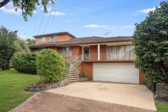 2 Castle Place Padstow Heights NSW 2211 Positioned in a quiet cul-de-sac within a peaceful, family-friendly pocket, this solid brick veneer residence offers flexibility, space and long-term potential in a highly central location. Just moments from Padstow and Revesby, close to Illawong and Alfords Point, and within easy reach of both Hurstville and Bankstown CBDs, the home delivers privacy without sacrificing convenience. Designed to accommodate large families or multi-generational living, the property can function as one expansive home or be configured as two separate two-bedroom accommodations. The main residence features a formal living area complete with a bar, flowing through to a separate formal dining room and an original kitchen presented in pristine condition for its age, complete with a walk-in pantry. From the kitchen, step out to a rear porch with stairs leading down to the backyard. This level also offers two bedrooms with built-in wardrobes, ducted air conditioning, a linen closet, and a spacious two-way bathroom with shower, separate bathtub, bidet and separate toilet. At the front of the home, an elevated balcony and porch provide a pleasant outlook over the street. The secondary accommodation provides excellent privacy and flexibility, ideal for in-law children or extended family. It includes its own kitchenette with ample storage, separate living and dining area, private access to the backyard, powder room and additional toilet. Upstairs, there are two generous bedrooms with built-in wardrobes and balcony access, a landing area, and a full bathroom with a shower and toilet. Please note the upstairs balcony requires attention and will not be accessible during open inspections. On the ground level, the home continues to impress with a double garage accessible from the driveway, which also allows off-street parking for two additional vehicles. There is extensive under-house storage, a separate workshop, a billiards or games room with sliding door access to the backyard, a bar area ideal for entertaining, and a separate laundry with external access and an additional toilet. Set on a generous parcel in a tightly held street, the property also presents future development potential subject to council approval. Whether you are searching for a spacious family home, a blank canvas ready to renovate and personalise, or a unique investment with genuine dual income potential, this is an opportunity not to be missed. 2 Castle Place offers flexibility, space and future upside in one of Padstow Heights' most desirable and convenient locations.