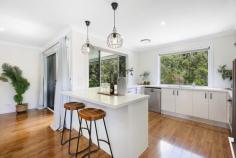 5 Golden Grove Boulevard Reedy Creek QLD 4227 $2,195,000 An oasis of modern comfort, seclusion and style, this light-filled residence delivers effortless versatility. Backing onto a leafy reserve that provides a tranquil outlook, it sprawls out across two levels. Designed to harmonise space and connection, a contemporary open plan kitchen, living and dining area headlines the upper level, offering a fresh and bright hub for the family to gather. Alternatively, a second living area beckons downstairs, plus both flow onto breezy balconies, ideal for a morning coffee or evening wine. Downstairs, the master suite also spills onto a balcony, complemented by a walk-in robe and a stylish ensuite. Three remaining bedrooms and two modern bathrooms are spread across both levels, while self-contained quarters enhance the property's appeal and functionality. Boasting a living and dining zone with wet bar, it accompanies two bedrooms connected by a Jack'n'Jill style ensuite. Outdoors, laid-back leisure awaits. The oversized pool, sun deck and covered cabana rests at the heart of this private backyard oasis, creating an idyllic place to entertain guests or sit back and savour tree-lined outlook. There's so much space in the backyard for kids and pets to make memories too, punctuated by established fruit trees. Tucked away in a peaceful, family-friendly neighbourhood on an 861m² block, this location exudes a sense of calm that's rare this close to amenities. Reedy Creek Village shops, cafes and services are only three minutes away by car, with esteemed schools including Hillcrest College, King's Christian College and Clover Hill Primary School between 4 – 7 minutes drive. Convenience continues with Robina Town Centre within 9 minutes and golden beaches accessible in approx. 10 minutes. Ideal for growing or multigenerational families or those seeking a quiet yet connected lifestyle, make this move-in ready modern sanctuary your next home sweet home. Inspect today! House Features: Fresh, light-filled steel-framed family home overlooking a lush and leafy bushland reserve Contemporary kitchen features stone benches, induction cooktop, breakfast bar Living areas on each level; upstairs open plan living and dining area adjoins the kitchen Ground floor master suite with balcony access, pendant lights, large walk-in robe, ensuite with dual vanity Two bedrooms downstairs with built-in robes; one with balcony access One bedroom upstairs with built-in robes Bathrooms on each level; the main with a dual stone vanity, linen cupboard, shower, bath and enclosed toilet Self-contained quarters, including a living and dining zone with wet bar, split system and two bedrooms connected by a Jack'n'Jill style ensuite Oversized pool with an expansive alfresco deck and covered cabana Upper and lower level balconies, both connecting to internal living zones Private backyard oasis Sitting area veranda with deck Abundant storage, including the laundry Double and single garages Ducted air-conditioning Security screens New carpet installed 2026 Under house access Property Features: 861m2 block backing onto a reserve Elevated position, capturing cool breezes Solar system Fruit trees, including mulberries, figs, orange, limes, banana, grapefruit and papaya Location: Approx. 3 mins to Reedy Creek Village shops, cafes and services Approx. 4 mins to Hillcrest College Approx. 6 mins to King's Christian College Approx. 7 mins to Clover Hill Primary School Approx. 9 mins to Robina Town Centre Approx. 9 mins to Burleigh Heads Approx. 14 mins to Palm Beach Approx. 17 mins to Currumbin Alley Approx. 20 mins to Gold Coast Airport Approx. 24 mins to Surfers Paradise