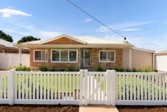 470 Walnut Avenue Mildura VIC 3500 $599,000 - $658,000 Katrina Wootton, Sales Agent and Marketing Specialist at Ray White Mildura, proudly presents for sale this immaculate, fully renovated residence, set on an impressive 1048sqm allotment, offering a level of finish that is simply exceptional. From the moment you arrive, the beautiful façade, crisp white picket fence and inviting green garden create a warm yet refined first impression. This is a home where presentation matters and every detail has been elevated. Step inside and you will immediately appreciate the cohesion and craftsmanship. Elegant white stone finishes define the kitchen, complemented by brushed metal tapware and a beautifully appointed butler's pantry that enhances both practicality and style. The bathrooms are a true statement, featuring terrazzo tiles from floor to ceiling that reflects a high end, designer aesthetic. Quite simply, the finishes throughout this home are a 10 out of 10. Everything is brand new, from appliances and carpets to lighting and air conditioning. All three bedrooms include ceiling fans and are serviced by ducted heating and cooling, ensuring comfort in every season. Outdoors, the value continues. A substantial 12m x 6m shed with an additional 6m x 6m awning provides incredible versatility for storage, hobbies, trades or entertaining. Side access via electric gates makes secure vehicle entry effortless. The gardens and lush green lawn are maintained by automatic sprinklers, keeping the property pristine all year round with minimal effort. The expansive yard offers ample space for families, pets or future additions, while the added convenience of an external toilet and sink enhances functionality for those who love to entertain. Positioned in a well established Mildura location rated a strong 7.5 out of 10, you are within easy reach of schools, parks, shopping and the CBD. This is a rare opportunity to secure a fully transformed home where the hard work has been done and the result is outstanding.