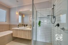 19 Scenery Dr Clyde North VIC 3978 $800,000 - $880,000 A Masterpiece of Style and Design Situated in the highly sought-after Meridian Estate, this Sienna-built home is a true statement of style, sophistication, and attention to detail. From the moment you step inside, you’ll be captivated by the seamless flow, expansive living spaces, and premium finishes that define this residence. Boasting four generously proportioned bedrooms, including a primary bedroom with a walk-in robe, luxurious ensuite, and its own split-system air conditioning, every member of the household enjoys comfort and privacy. At the heart of the home, the gourmet kitchen is nothing short of spectacular. Featuring 900mm premium appliances, a 40mm stone waterfall island, walk-in pantry, and abundant storage, it is perfectly designed for both everyday living and hosting unforgettable gatherings. Square-set plaster ceilings and engineered oak floors enhance the sense of space and refinement throughout the living areas, while block-out and sheer blinds provide both style and privacy. Step outside to the rear timber alfresco deck, complete with ceiling fan, strip heating, and automatic café blinds. Double-glazed windows and doors ensure comfort year-round, while solar panels with battery storage deliver energy efficiency and peace of mind. Meticulously landscaped gardens frame the property, creating a serene setting for entertaining or quiet relaxation. Perfectly positioned close to St Germain Shopping Centre and Hillcrest School, this residence effortlessly combines prestige, convenience, and lifestyle. Every detail, from the high-end finishes to the energy-smart features, has been thoughtfully considered to create a home that is as functional as it is exquisite. This is more than a home - it’s a statement, a lifestyle, and an opportunity to secure a property of enduring quality and distinction.