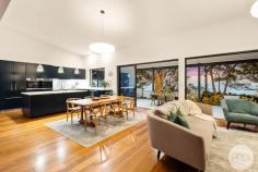 342 Wanda Avenue Salamander Bay NSW 2317 $2,900,000 to $3,100,000 Commanding an elevated position in one of Salamander Bay's most tightly held addresses, 342 Wanda Avenue is a masterfully executed, single level residence that delivers architectural presence, refined coastal luxury and breathtaking outlooks across the bay to Jimmy's Beach and the surrounding Wanda bushland. Built just eight years ago, the home presents as virtually new - timeless in design, impeccably maintained and completely move in ready. From its crisp modern façade to the resort style courtyard and pool, every element has been thoughtfully curated to balance striking architectural form with everyday comfort and functionality. At the heart of the home is an expansive open plan kitchen combined with dining and living areas that are crowned by soaring 6.5-metre ceilings - together, these areas create a dramatic sense of scale, light and volume. Floor to ceiling glazing frames the elevated coastal outlook. Wide sliding doors extend the living space, drawing the majestic 180 degree bay view spectacle indoors. The adjacent 50sqm covered alfresco deck provides an exceptional setting for entertaining, dining or simply unwinding while taking in the uninterrupted views that can be enjoyed from virtually every room. The custom designed chef's kitchen is both visually bold and highly functional, featuring fully integrated appliances including dual dishwashers, integrated fridge-freezer, wall mounted ovens, induction cooktop, wine fridge, Zip filtered water system and a generous walk in pantry. Designed for effortless entertaining, this is a kitchen where form and function work seamlessly together. Luxury continues throughout the home's bathrooms, finished with marble vanities, bespoke cabinetry, heated towel rails and underfloor heating, while the extensive use of premium natural materials - including hardwood flooring, pure wool carpets, limestone tiled bathrooms and granite tiled outdoor entertaining and pool surrounds - create a warm, refined and cohesive aesthetic. Privately positioned and beautifully sheltered, the sun drenched courtyard forms a true resort style retreat. The fully tiled in ground swimming pool, complete with in floor cleaning system and granite surrounds, is framed by clean architectural lines and glass balustrading. A perfect environment for relaxed summer living and entertaining. Completing the home is a premium electrical fit out featuring statement chandeliers, wall sconces and soft touch, electronically labelled switches - a subtle but powerful reminder that this is a residence where quality is evident in both the grand gestures and the finest details. Rarely does a single level home of this calibre, outlook and architectural quality become available - particularly one so young, sophisticated and entirely ready to enjoy. This is coastal living at its most refined. Take our word for it… you are likely to fall in love with this property the moment you walk through the front door. Property Features: - Modern single level residence, only 8 years since built - Elevated bay views extending to Jimmy's Beach and Wanda bushland - Spectacular open plan kitchen, dining and family zone with 6.5m ceilings - Expansive 50sqm alfresco deck ideal for entertaining - Custom chef's kitchen with: . Integrated fridge-freezer . Two integrated dishwashers . Wall mounted ovens . Smeg Induction cooktop . Wine fridge . Zip water filtration . Walk in pantry Extensive use of premium natural materials including: . Marble benchtops in all wet areas . Hardwood flooring . Pure wool carpets . Granite tiles to outdoor entertaining and pool areas . Limestone tiled bathrooms with underfloor heating . Luxury bathrooms with marble vanities, custom cabinetry and heated towel rails . Fully tiled in ground pool with in-floor cleaning . Sheltered, sun drenched courtyard ideal for year round enjoyment . Premium electrical fit out with chandeliers, wall sconces and soft touch labelled switches Nothing to do - move straight in and enjoy this stunning coastal residence.