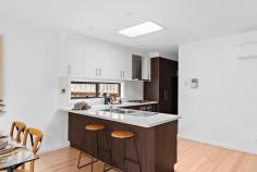 3/143 Kars Street Frankston South VIC 3199 $750,000 - $825,000 Sensationally placed to bask in the spoils of Frankston's beachside lifestyle, this contemporary single-level unit provides the promise of low-maintenance without compromising proximity to the lively eateries and retail options of both Frankston and Mount Eliza Village. Positioned well-within the Frankston High School zone and impressively renovated, the three bedroom design welcomes with a dedicated entry hall, where solid timber floors and a fresh white colour colour scheme hints at the sophisticated spaces to follow. Open-plan and sun-drenched, the private entertaining domain brings living and dining zones to a stone-finished kitchen featuring stainless steel appliances, window splashback, chocolate cabinetry, and direct access to the double garage via the laundry. Step outside to a courtyard with bamboo backdrop, while back inside, accommodation flaunts a master suite with walk-in robe and ensuite, and two secondary bedrooms, one with ensuite access to the main bathroom. With gas ducted heated, split-system air conditioning, intercom, a water tank, and rear garden shed, this well-equipped residence sits a short walk from Frankston Beach via Sweetwater Creek, Bayside Shopping Centre and Frankston Train Station, local reserves, and public transport.