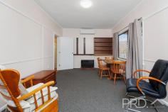 41 Ryan Street Talbingo NSW 2720 $329,000 Set upon a generous north facing allotment on the high side of Ryan Street, sits this two-bedroom high-set home, offering a large internal layout and fully covered front timber deck that captures the sun right throughout the day. With ample opportunity to update throughout or move straight in. Boasting two great sized bedrooms, large formal living and kitchen areas, additional rear mudroom area, internal laundry and large front, fully covered entertainers' deck. 41 Ryan Street offers comfortable living and value in the heart of the picturesque township of Talbingo. Do not miss your opportunity to secure such a great cottage style home in the heart of town, call today to book your inspection! Premiere Features: - Two great size bedrooms positioned to one end of the plan, master boasting ceiling fan - Centrally located bathroom with combined shower over bath, single vanity and shaving cabinet - Kitchen overlooking the rear yard with ample storage options and timber flooring - Large formal living area serviced by reverse cycle air conditioning and direct access to the front deck - Separate toilet - Internal laundry - Large mudroom area with direct access to the rear yard (great area to increase kitchen or living area floor space) - Large fully covered front timber deck, perfect for entertaining family and friends - Quaint rear deck, fully covered overlooking the yard - Single lock up garage and vehicle access to the back yard - Fully fenced approximate 732m² allotment with low maintenance ground and established fruit trees Do not miss your opportunity to view this two bedroom home in the heart of town, call today to book your inspection.