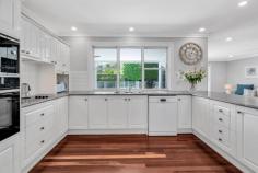 6 Julah Court Ashmore QLD 4214 $2,950,000 Set up high on the hill in a quiet cul-de-sac on a huge 1,302m² allotment looking out to Royal Pines Resort, Carrara Stadium & the beautiful hinterland, this perfectly presented quality-built family home presents in "AS NEW" condition and must be seen to fully appreciate all that is an on offer. From its commanding, elevated position and with no neighbours looking in on you, this meticulously designed & crafted masterpiece was lovingly built by the current owners based on the style of homes they fell in love with on a trip to the Olympic Games in Atlanta, and has been lovingly cared for & maintained to an immaculate standard since then … you would not expect to find a home like this to exist in this prime, central location and outstanding elevated position in the heart of the Gold Coast !!! Key features of this absolutely stunning family home include ... * Private 1,302 m2 allotment at the top of the hill offering gorgeous panoramic views * Prime, central & convenient location ... only minutes away from anything & everything that the Gold Coast has to offer * Very safe & secure ... quiet cul-de-sac with fantastic neighbours * Grand entrance with soaring high ceilings and feature timber flooring * The cosy and inviting formal lounge area welcomes you with 2.7 metre high ceilings and large French doors opening to covered verandahs * Centrally located kitchen looks to the pool and entertaining area, and boasts plenty of storage & bench-space * The 2nd living & dining area adjacent to the kitchen flows seamlessly to covered poolside entertaining area * Inviting North-East facing pool and covered entertaining area is the perfect place to relax and unwind with family & friends for hours on end in total privacy * Wrap-around verandahs surround the home offering a serene space to simply sit, catch your breath, relax and appreciate all that your new home offers * Over-sized, character-filled loft home-office, rumpus or extra bedroom sits above the garage and offers sensational views and an abundance of storage with the potential to convert the whole garage and loft to a fully self-contained apartment * Master bedroom features stunning modern ensuite and designer-fitted walk-in robe * Three additional large bedrooms, all complete with mirrored robes and study nook areas designed to take advantage of the view * Large family bathroom with separate toilet * Conveniently placed powder room services all internal & external areas * Laundry opens to outdoor drying area * Over-sized double garage with additional large storage room to the rear and extra covered storage behind * Huge amount of secure off-street parking for extra cars, boat, caravan, trailer etc * The picture-perfect, easy-care lawns & gardens with mostly native plants (complete with irrigation system) frame & compliment this absolutely stunning property * Tranquil "Gunyah Park" is a large, quiet & pleasant neighbourhood park just down the street for pets and family to play, with sheltered picnic tables, barbecue, and shaded & fenced playground to keep the kids safe ... whilst Royal Pines Resort, Benowa Village Shopping Centre, Emerald Lakes and Carrara Stadium & sports complex are all an easy walk away ASHMORE ... WHAT A GREAT PLACE TO LIVE !!! Ashmore is one of the most practical and central suburbs that the Gold Coast has to offer, located close enough to all the action yet far enough away from it all ... it is frequently high-lighted on major property reports as a recommended investment "Hot Spot" assured of ongoing demand and outstanding capital growth with real estate in the area very much in demand. With its elevated location, the vast majority of Ashmore is on safe, high, flood-free ground with numerous parks, schools, shopping centres, sporting & medical facilities all at your finger-tips, whilst offering easy access and only minutes away via main arterial roads to beaches, the Broadwater & parklands, cafes, restaurants, several CBD's and the M1 giving access to Brisbane & Coolangatta airports. Southport CBD/China Town, the light rail system, Griffith University, Gold Coast Hospital, Pindara Private hospital and other medical precincts are all only minutes away, as are Pacific Fair, Robina Town Centre, Australia Fair and Runaway Bay shopping centres. Ashmore is a fantastic place to live and invest in for both solid capital returns and central & convenient living, and because of this the suburb is truly becoming even more of a highly-sought after location than the current residents (and investors) already know it to be !!!