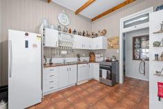 387 Derreen Rd Murrays Bridge QLD 4370 $785,000 Beautifully restored, this charming cottage is the original Wildash State School which was built in 1882 and moved to it's present location on Derreen Rd. Sitting on a lovely 5 acre parcel, enjoy the serenity & rural outlook that this property offers! Features include - 3 bedrooms or 2 plus an office 11 ft ceilings with exposed beams & stained glass features Walk in robe in main bedroom Cosy lounge room with wood heater Reverse cycle air-conditioning Lovely kitchen with gas stove & electric oven Renovated bathroom with large walk in shower Separate toilet Practical laundry Back deck overlooking the property Fully fenced house yard 2 x 5,000 gallon rainwater tanks plus a dam NEW 8 x 7m colorbond shed NEW roof & the house has been relevelled in the last 12 mths Septic system has been replaced Chook pen, round yard & 40 ft shipping container included with the sale Convenient 10-15 minute drive from Warwick