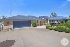 57 Ray Carter Drive Quirindi NSW 2343 $970,000 - $995,000 Positioned to capture sweeping views and designed for comfort, efficiency, and relaxed country living, this beautifully maintained home in Quirindi delivers an impressive blend of modern upgrades, thoughtful layout, and standout outdoor spaces. Water, Power & Climate Efficiency: The property offers the flexibility of town water and rainwater from the tanks, this home currently runs on the soft water system alone. Solar panels are installed on both the sheds and the house. A battery storage station allows for self-sufficiency, saving massively on power costs! Recently installed ducted air conditioning ensures year-round comfort, while awnings and tinted windows help keep the home cool during the warmer months. Home Features: Inside, the home offers a spacious and practical layout with an inviting open plan living area and a dedicated formal dining space. At the front of the home, the front room is utilised as the perfect work from home setup. The modern kitchen is a standout, featuring: • Stone benchtops • Gas cooktop • Soft close drawers and cabinetry • Dishwasher • Excellent storage and workspace An enclosed entertaining area extends the living space and frames a stunning elevated view over the landscape below - ideal for year round gatherings. Well Appointed Bedrooms & Bathrooms: • Two bedrooms with carpet, built in cupboards fitted with both shelving and hanging space • A generous main bedroom with a walk-in robe and a spacious ensuite The main bathroom is a convenient three-way design, perfect for families or guests. Shedding, Storage & Access: The property offers excellent vehicle and workshop space with remote controlled doors on both the sheds and the garage. The garage also includes the laundry and a separate toilet, adding practicality. Rear access through the garage provides additional convenience for vehicles, trailers, or garden equipment. Outdoor Living & Gardens Both the front and back yards feature charming garden gazebos, creating peaceful spots to relax or entertain. The gardens are well established, partially irrigated, and set on timers for easy maintenance. The outdoor spaces are designed to complement the home's elevated outlook and peaceful setting. Connectivity: The property is equipped with NBN connection, ensuring fast and reliable internet for work, streaming, or gaming. Set against the backdrop of Quirindi's sweeping rural vistas, this home captures the very best of peaceful country living without compromising modern comfort or convenience. Thoughtfully upgraded, beautifully maintained, and positioned to take full advantage of its elevated outlook, it offers an inviting lifestyle where every detail-from the efficient energy features to the serene garden spaces-enhances day-to-day enjoyment. With its impressive views, practical design, and sought after location close to all that Quirindi has to offer, this property presents an exceptional opportunity to secure a home that truly embodies relaxed, scenic living.