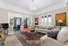 18 Grafton St Warwick QLD 4370 $689,000 Perfectly positioned in the heart of Warwick, this grand home oozes street appeal and is handy to schools, the CBD and many other facilities. This immaculate home is the perfect blend of timeless elegance along with modern day luxuries. I guarantee after inspecting this beautiful property, you will not want to leave! From the minute you enter the front gate, you are sure to be impressed! Here's what you will love about this home which has undergone major improvements in the last few years: * Freshly painted inside & out including the roof * Beautiful front verandah with north easterly aspect * Absolutely beautiful entry * VJ walls, leadlight features & high ceilings throughout * 2 x beautiful, sizable bedrooms plus a generous sleepout & study space * Spacious living areas with beautiful chandeliers to complement the space * R/C air-conditioners x 2 + insulated ceiling * Stunning NEW kitchen with electric appliances, dishwasher & walk in pantry * It offers ample bench & storage space along with a built in display cabinet * NEW custom made window coverings throughout - shutters & curtains * Tastefully renovated bathroom with refreshing pops of colour * Double carport with gable roof * Private & well fenced 911 sqm block with manicured gardens * NEW poly rainwater tank * 6.6 Kw solar (20 panels) - current owner has not paid a power bill in 4 years! * Security lights at the front and rear of home * An abundance of storage space underneath the house * A studio/workshop space downstairs as well Don't miss out on your chance to call this gem your own!