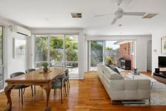 52B Dalpura Circuit Frankston VIC 3199 $780,000 - $858,000 Flooded with natural light, this beautiful townhouse is set privately on its own battle-axe block with no body corporate or common land. Positioned within the highly sought-after Whistlestop Estate, this rare single-story residence offers a low-maintenance lifestyle without compromising on luxury. The home makes a grand first impression with 2.7m ceilings and the timeless elegance of hardwood flooring flowing through the open-plan living and dining areas. The heart of the home is a stunning, versatile kitchen designed for the culinary enthusiast, featuring sleek Stone bench tops, a bright skylight, and an offset butler's pantry. This gourmet space is fully equipped with premium appliances, including a gas cooktop, an Asko Pro Series oven, and an Asko dishwasher. Accommodation is equally impressive, headlined by a large master bedroom with an ensuite, walk-in robe, and stunning garden views. Two additional spacious bedrooms, along with a fourth bedroom or study-which also enjoys picturesque garden outlooks-feature built-in robes and ceiling fans for year-round comfort. The contemporary family bathroom offers semi-ensuite access to the second bedroom, complemented by a convenient powder room, totaling three toilets, which are serviced by a dedicated water tank that also provides water for the garden. Modern comfort and security are at the forefront of this build. The home stays perfectly tempered via Braemar ducted heating, evaporative cooling, and a Mitsubishi split system, supported by Rinnai continuous flow gas hot water and custom-height double-glazed windows throughout. A Volta ducted vacuum system provides effortless cleaning. For ultimate peace of mind, the property is protected by a Bosch security alarm and a remote-control front gate leading to a double garage with internal access. Outside, the lush surroundings are effortlessly maintained by an automated sprinkler system. Located just minutes from local schools, shops, Peninsula Link, and Frankston's award-winning beaches, this is a unique opportunity to secure a premium home in a prime location.