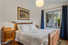 19 Cecil Road Blackheath NSW 2785 $1,200,000 - $1,300,000 'Mountain Lodge' is a character mountain property that has a feeling of immediate warmth on arrival and boasts welcoming spaces that enhance the enjoyment of relaxation or entertaining indoors or out. Retained high ceilings, original timber flooring, timber lined walls and ceilings ensure that this home captures your heart from the moment of entry. The main living room, with its slow combustion fire, is bathed in natural light and offers an attractive garden aspect as does the sunroom to the rear. Each of the bedrooms offer a peaceful ambience and the master boasts a practical shower ensuite and level access through double glazed french doors. Every metre of this property has been used to its best advantage. From the clean lined open plan kitchen and dining area there is access to a spacious sunroom. With double glazed stacking sliders, this space boasts a beautiful indoor/outdoor connection with an extraordinary cultivated garden that is a genuine reflection of a space that has been guided by a passionate horticulturist's hand. Separate laundry and spacious storage room, plus a large caravan-sized carport and internal roof cavity storage, are examples of the aesthetically pleasing thought that has been exercised over the years of sympathetic renovation. Ducted gas heating and a wall mounted reverse cycle air conditioning unit also ensure comfort through the changing mountain seasons. Fully fenced to the rear, this home is perfect for young families, pet-lovers, weekend adventurers or down-sizers seeking a property that offers level entry access from multiple points. Those with a keen interest should add this one to the priority viewing list without delay. Breakdown of Features: Character mountain cottage in a quiet position moments from breathtaking views Retained original features include original timber floors, timber lined ceilings and walls Master bedroom with practical shower ensuite; pull-down ladder access to roof storage Main living room with slow combustion real wood fire and huge windows with natural light Spacious open-plan island bench kitchen with SMEG gas cooking and dining area Spacious sunroom to rear with double glazed sliding stacker doors and fluid outdoor connection Stylishly renovated main bathroom with deep bath and additional built-in linen storage Ducted gas heating; wall mounted reverse cycle air conditioning unit; solar panels Separate stylish laundry and adventure equipment storage room; large caravan-sized carport Horticulturist cultivated garden with sandstone seating areas, greenhouse and garden shed 1.3km gentle stroll or easy 3min drive to city train links, village cafes, shops and amenities