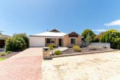 19 Combewood Loop Carramar WA 6031 Comfortable Family Living in a Prime Location Tucked away on a quiet street close to shopping centres, schools, and public transport, this well-cared for 4x2 home is a must-see. The generous master bedroom is positioned at the front of the home and features a spacious walk-in robe, ensuite, and roller shutters for added comfort and privacy. The spacious lounge offers a cosy yet functional living area complete with a wood stove, split-system air conditioning, and roller shutters. The open-plan family, dining, and kitchen area flows seamlessly to a lovely covered alfresco, making it ideal for entertaining. The kitchen is well appointed with ample bench space and plenty of cupboard storage. Three additional good-sized minor bedrooms all include built-in robes and are serviced by a light and bright main bathroom. Outside, the private backyard provides plenty of space for children and pets to play, with a wrap-around patio extending from the side to the rear of the home. Additional features include raised garden beds, established gardens, shed, and gated access to the carport. - Roller shutters - Quality window treatments - Easy care flooring - Neutral tones throughout - Wood stove in front lounge - Split system A/C - Expansive paved area - Roller door to single carport - Gates access to rear of property - Built in 1997 - Block size approx 500m2