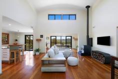 18 / 463 Trees Road Tallebudgera QLD 4228 $1,695,000 Co-existing in complete harmony with its natural wonderland setting, this residence is an stylish, serene and restful retreat. Set within the exclusive Glencairn Estate on a 2395m² block, where peace and privacy are paramount, it also basks in breathtaking vistas that sweep across the hinterland to the majestic Mt Tomewin ranges. Radiating calm and charm across two levels, blackbutt timber floors and high ceilings further amplify the sense of warmth and comfort. Chef's will be inspired to cook up a feast in a kitchen appointed with stainless steel benchtops and 900mm gas cooktop, with the option to enjoy it in the adjoining casual meals area or elegant dining zone. Then, for connection and conversation, retreat to the lounge room crowned by a soaring 4.9m ceiling, with an imported PyroClassic wood heater to curl up by in cooler months. New carpet flows underfoot in the bedrooms, led by a master suite with a built-in robe and contemporary ensuite. Two additional bedrooms with built-in robes are served by a modern bathroom, and one spills onto a balcony to soak in the fresh hinterland air. A bespoke circular staircase leads to a ground level study and versatile multipurpose room with ensuite – ideal for use as a teenage retreat, rumpus or guest quarters. Storage is abundant with under-house and internal storerooms, plus a laundry with an extra powder room ensures convenience. Outdoors, this tranquil haven continues to impress. The wraparound balcony is a sublime spot to savour the ever-changing colours of the valley and hinterland, while the front with built-in bar is a delightful spot to entertain. Lush greenery awaits at every glance too, while beyond your borders, protected council reserves add to its tranquillity and beauty. One of just 19 homes in a secure, gated enclave, you don't have to compromise on convenience. Tallebudgera State School and local shops are just 7 minutes away, St. Andrews Lutheran College is approx. 10 minutes by car, and vibrant Burleigh Heads beaches, boutiques, bars and more beckon in approx. 15 minutes. For those seeking a sanctuary with soul, serenity and seclusion – this is the one you've been waiting for. Inspect today! House Features: Effortlessly stylish, comfortable and charming haven co-existing in complete harmony with the natural habitat Basks in breathtaking vistas that sweep across to the majestic Mt Tomewin ranges Spans two levels, linked by a beautiful handcrafted circular staircase Chef's kitchen, equipped with a 900mm gas cooktop, stainless steel countertop for meal preparation, utensil racks, ample storage, breakfast bar and meals area Vast lounge crowned by a soaring 4.9m ceiling, offset by blackbutt timber floors and an imported PyroClassic Wood heater Dining area opens to balcony, with 3.2m ceiling Master suite with built-in robe and a contemporary ensuite with full-height tiling Two bedrooms with built-in robes; one with balcony access New carpet in all bedrooms Modern main bathroom Versatile multi-purpose room downstairs with ensuite; ideal as a teen retreat, rumpus, or bedroom Ground floor study opens to the outdoors Wraparound balcony basking in panoramic valley and hinterland views Front entertaining deck with built-in bar Laundry with additional powder room Under-house and internal storerooms Double carport Ceiling fans throughout Property Features: 2395m2 block in the gated Glencairn Estate – a secluded and exclusive enclave of just 19 homes Cocooned by council reserves and enriched by a Voluntary Conservation Agreement for Common Ground Driveway parking Lush, established greenery Veggie garden Wastewater system Inground water tank plus connected to town water Location: Approx. 7 mins to Tallebudgera State School and local shops Approx. 10 mins to St. Andrews Lutheran College Approx. 15 mins to Burleigh Heads Approx. 17 mins to Palm Beach Approx. 18 mins to Currumbin Alley Approx. 21 mins to Gold Coast Airport Approx. 36 mins to Surfers Paradise
