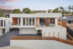 1 / 29 Government Road Nelson Bay NSW 2315 Positioned in one of Nelson Bay's most sought after addresses, this brand new boutique, luxury residence located at 29 Government Road, Nelson Bay captures the essence of refined coastal living. Combining architectural sophistication, coastal elegance, and unrivalled lifestyle convenience, this residence has been meticulously designed to embrace its north-facing orientation and breathtaking water views. Just a short stroll from Dutchman's Beach, d'Albora Marina and the vibrant Nelson Bay town centre, this home has been perfectly placed to enjoy everything the Bay has to offer from morning walks along the foreshore to evenings dining by the water. Spanning two impressive levels, this stunning brand new duplex offers four generous bedrooms, including a ground floor guest suite with private ensuite, ideal for multi-generational living, guests, or flexible home office use. Three beautifully appointed bathrooms and a double lock-up garage with internal access for comfort and practicality of modern living. At the heart of the home lies a sun drenched open-plan living, dining, and kitchen area, seamlessly connecting to an alfresco balcony that frames glimpses of the bay the perfect setting for entertaining or unwinding in style. Outdoors, enjoys its own landscaped backyard and private patio, offering a rare touch of tranquility and space within a modern coastal development. This inviting outdoor zone is ideal for relaxing, gardening, or hosting summer gatherings with family and friends. This exclusive enclave perfectly balances contemporary design and coastal lifestyle. With beaches, the marina, boutique shopping, and dining all within easy reach, it promises a life of convenience and sophistication. Whether you're seeking a permanent residence, a luxurious holiday retreat, or a smart investment in a blue-chip location, this designer home delivers the ultimate in lifestyle, quality, and position.