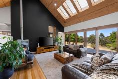 45 Bromfield Drive Tolmie VIC 3723 $1,190,000 - $1,270,000 Nestled on 10 acres of serene High Country landscape, 'Timber Leigh' is a sanctuary where nature and luxury coexist in perfect harmony. Drive through an eco-friendly nature verge and wildlife corridor to arrive at a beautifully maintained home site, where the land opens into a private cleared haven. Every corner of this exquisitely renovated residence evokes a sense of calm, from the sunken living area with floor to ceiling windows opening onto a deck overlooking the feature dam, to the gentle sounds of nature that fill the air - a space designed to soothe, inspire, and reconnect you with the outdoors. The master suite is a private retreat in itself, featuring soaring ceiling and a wall of floor to ceiling windows, a stylish ensuite, and a separate Swedish bath room with wood heater, leading seamlessly to a sauna and cold ice bath area. Imagine relaxing in the deep warm bath while listening to the natural symphony outside, a true indulgence in mindful living. The open plan living areas are rich in texture and light, with soaring ceilings, skylights, a gourmet kitchen with six burner gas cooktop, and a loft that serves as the perfect study or creative workspace. Two additional generously sized bedrooms, a stylish main bathroom, and a large laundry/mudroom complete this thoughtfully designed home. Beyond the home, 'Timber Leigh' offers exceptional infrastructure to support a fulfilling rural lifestyle. A massive shed houses a fully insulated gym and workshop, with space for large vehicles. Hobby animals are catered for with animal shelters, a chicken coop, and a secure dog run. Enjoy productive gardens, a greenhouse, and an enclosed orchard. Every element of this property has been curated to create an extraordinary, harmonious, and mindful lifestyle, all within the vibrant regional township of Mansfield - A perfect balance of privacy, convenience, and connection to nature. Features You'll Love: Architecturally renovated home set in a private, natural environment Sunken living area with floor to ceiling windows opening to deck overlooking a spring fed dam with fish Large master bedroom with floor to ceiling windows, walk-in-robe and stylish ensuite Swedish outdoor bathroom with deep tub, wood heater, sauna and cold plunge area Open plan living with soaring ceilings, skylights and solid timber flooring throughout Split system air conditioning in main living and master bedroom Euro style fireplace and Nobo panel heaters 3kW solar system for improved energy efficiency Renovated bathrooms and new kitchen with 6 burner gas cooktop and quality finishes Upstairs loft ideal for study or work from home space Large laundry combined with practical mudroom and great storage Substantial shed with insulated gym, workshop and space for large vehicles and vans Vegetable gardens, greenhouse, enclosed orchard, chicken coop, animal shelters and secure dog run Water security with spring fed dam and 3 x 22,000L rainwater tanks servicing the home 10 acres accessed via established nature corridor with cleared surrounds and ornamental plantings Close to Mt Buller ski fields and the Mansfield township with cafés, schools, pubs and services Step into the calm, breathe in the space, and experience the balance 'Timber Leigh' offers. Contact us to arrange your private inspection and see how effortlessly life can slow down here.