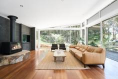 29 Cokeworks Road Coledale NSW 2515 Hidden away in a tranquil rainforest setting, this architect-designed residence at 29 Cokeworks Road, Coledale is a masterclass in contemporary luxury meets forest living. Positioned on an expansive 9,092m2 block comprising landscaped gardens, mature trees and open spaces, the home unfolds as a series of light-filled pavilions connected by glass, timber and stone, creating an exceptional sense of privacy, calm and architectural intent. YOUR HOME • In designing this home, ample consideration was given to the beautiful natural surroundings, the sunlight streaking through the trees as well as the ocean glimpses. The result is a sanctuary that allows you to feel like you're in your own private world. • This clever family-friendly layout provides a private wing for bedrooms, providing a quiet escape for each and every resident. • The heart of this home is the light-filled open-plan kitchen, dining and living area with expansive glazing and seamless flow to outdoor entertaining areas. This impressive space will undoubtedly provide the backdrop for many happy family memories. • A spacious and contemporary kitchen finished with sleek white cabinetry, generous island bench, quality appliances and views across the landscaped surrounds extending to the Sparkling Pacific Ocean beyond. • A large entertaining deck flows seamlessly from the living space. An ideal space for alfresco dining with the family during those warm summer months. • Warm timber flooring throughout living areas, enhancing the home's natural, modern aesthetic. • Statement fireplace anchoring the main living space, heating the home and creating a cosy retreat during cooler months. • Spacious master bedroom features custom joinery, tranquil outlooks and a calm, resortlike atmosphere. • Luxurious bathrooms with refined finishes, including a striking freestanding bath in the ensuite with views looking out into the surrounding leafy setting. • Spend your evenings enjoying a glass of wine with friends around the large firepit, enjoying the sounds of nature and stars above. • Electric gate for additional privacy with a double garage and plenty of additional off-street parking. YOUR LOCATION • Coledale is a popular seaside suburb, known for its beautiful beaches, excellent cafes, bustling monthly markets and friendly community. It offers all of the lifestyle benefits you could want without the crowds and traffic of other nearby coastal towns. • Positioned in a quiet, tightly held pocket of Coledale, surrounded by natural bushland and ocean views. • Close to popular cafés, local shops and the vibrant Coledale village • Easy access to Coledale train station for commute to Wollongong (approx. 30 min) and Sydney (approx. 1 hour) Designed for those who appreciate architecture, nature and understated luxury, 29 Cokeworks Road, Coledale is more than a home - it is a sanctuary. A rare opportunity to secure an architecturally significant residence in one of the Illawarra's most tightly held coastal enclaves.