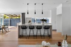 11 Stradbroke Avenue Frankston South VIC 3199 $1,250,000 - $1,375,000 Thoughtfully and fully renovated to create a seamless connection between indoor and outdoor living, this exquisite family home delivers a modern, elevated interpretation of bayside living in one of Frankston's most sought-after pockets. Privately set behind a front fence with electric gate, it balances beautifully proportioned rooms with intuitive flow, where sunlight fills each space and Tasmanian Oak floors add warmth and refinement throughout. Lush, resort-style gardens provide an impressive welcome, unfolding to a carefully resolved interior that effortlessly balances entertainer and retreat. Versatile living and dining zones are enhanced by vaulted ceilings and refined, top-tier finishes. With a gentle push, bi-fold doors open to create effortless indoor-outdoor entertaining, extending the open-plan living area to connect the front and rear gardens, all set on approximately 601sqm with ample room for a pool (STCA). Engineered stone surfaces, expansive glazing and soft-close cabinetry define the standout kitchen, showcasing premium appointments including a Westinghouse 900mm underbench oven and gas cooktop, Oliveri tapware, and a butler's pantry designed for both functionality and entertaining. The main bedroom is bathed in brilliant morning light and features a privately accessed deck, walk-in robe and twin-vanity ensuite with double shower and heated towel rail. Three additional bedrooms, all filled with natural light and finished with solid timber floors underfoot, surround a matching central bathroom with feature bath. Additional highlights include a gas log fireplace, split-system heating and cooling, a 12.7kW solar system, instantaneous hot water, extensive double glazing for enhanced comfort and efficiency, built-in joinery, a separate home office, a generously sized garden shed, and secure parking. Positioned within both the Overport Primary and Frankston High School Zones, and moments from Sweetwater Creek, Delacombe Park, Frankston Foreshore, Foote Street and Norman Avenue cafés, Bayside Shopping Centre and Frankston Hospital, this is a lifestyle address where demand remains consistently strong.