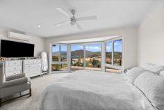 69 Harbour Line Drive Goughs Bay VIC 3723 $1,200,000 - $1,260,000 Perched in the heart of Goughs Bay, this beautifully renovated Hamptons style home sits on an extraordinary 2,209m² block, offering sweeping lake and mountain views - Imagine the spectacle if the lake were full! The block presents a rare opportunity for subdivision (STCA), with expansive flat areas perfect for boats, cars, and trailers. Designed for entertaining and comfortable living, the home features bright open-plan living and dining, with a chef's kitchen that's a showstopper. The kitchen boasts Caesarstone benchtops, large gas cooktop, deep drawers, and an oversized breakfast bar, while quality finishes continue throughout with double glazing, solar system, ducted air-conditioning, a Euro fireplace, merbau decking, and remote controlled zip track blinds. Outside, there's massive high span undercover storage for large boats, plus additional sheds and carports on the high side. A covered entertaining area overlooks a flat, fully fenced yard ideal for kids or pets, while a spacious front deck is the perfect spot to soak in the stunning vistas. The master suite is a private retreat with large bay windows, complemented by tastefully renovated ensuite and main bathrooms. Just 15 minutes from Mansfield and within reach of ski fields, Goughs Bay offers the perfect lakeside lifestyle, with the local Boat Club ideal for a seafood platter or Friday night drinks. Features You'll Love: Stunning Hamptons style home with panoramic lake and mountain views Extraordinary 2,209m² block with opportunity for subdivision (STCA) Numerous flat areas for boats, cars, and trailers Massive high span undercover storage plus additional sheds and carports Bright open plan living, dining, and chef's kitchen with gas cooktop Caesarstone benchtops, deep drawers, and oversized breakfast bar Master suite retreat with bay windows & deck access Double glazed windows & doors throughout Solar system for energy efficiency Ducted air conditioning and Euro fireplace Tastefully renovated main and ensuite bathrooms Merbau decking front and back with remote controlled zip track blinds at rear Covered entertaining area overlooking fully fenced yard - ideal for kids or pets Front deck perfect for relaxing and enjoying lake views Prime Goughs Bay location, 15 mins from Mansfield and 40 mins to Mt Buller Boat Club nearby for seafood platters and Friday night drinks More than a home - it's a lifestyle of luxury, entertaining, and breathtaking lakeside views.