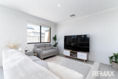 27 Modernism Ave Alkimos WA 6038 $950,000 Welcome to 27 Modernism Avenue, Alkimos – a beautifully crafted 2025 build by New Choice Homes that perfectly blends sophistication, comfort, and contemporary design. This premier residence is finished with all the bells and whistles, offering a tranquil lifestyle with high-end features throughout. Step inside and be greeted by soaring 28-course ceilings and expansive 600x600 tiling that enhances the sense of space and light within the main living areas. The thoughtfully designed floorplan delivers both functionality and style, making it ideal for everyday living and effortless entertaining. The king-sized master suite is a true retreat, featuring stunning picture windows that invite natural light and outdoor scenery indoors, creating a serene and relaxing atmosphere. Complete with a walk-in robe and a sleek, modern ensuite with glass shower, this space offers the ultimate in comfort. A spacious theatre room provides the perfect setting for movie nights or quiet relaxation, while the separate minor bedroom wing includes three generously sized bedrooms, all fitted with built-in robes and soft carpeting. These are serviced by a contemporary family bathroom, offering privacy and convenience for the whole family. At the heart of the home lies a stunning open-plan living, dining, and kitchen area, framed by walls of windows that flood the space with natural light. The designer kitchen features a central island with engineered stone benchtops, a 900mm oven with 5-burner gas cooktop, dishwasher and microwave recesses, and a well-appointed pantry. The adjoining laundry offers additional storage with linen shelving and matching stone benchtops, ensuring practicality meets style throughout. Seamlessly extending from the living area, the spacious lounge opens onto a covered alfresco, perfect for entertaining or unwinding, all overlooking a neat and low-maintenance garden. Features include (but are not limited to): • Double garage with shopper's entry • 28c high ceilings throughout • Reverse-cycle ducted and zoned air conditioning • Instantaneous hot water system • Quality finishes and modern design throughout • Solar- 14 panels with a 5kw inverter ( install date 31st July 2026) Investor Highlights: • Block size: 426m² • House size: 180m² • Estimated rental return: $700 – $730 per week