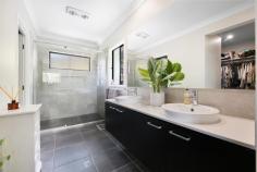 10 Mieke Court Burleigh Heads QLD 4220 $2,295,000 Positioned at the end of a quiet cul-de-sac, this large family home occupies an elevated 961m² block and offers space, privacy and a highly functional layout ideal for family living. With multiple living areas, generous proportions and excellent outdoor amenities, the home has been designed to comfortably accommodate growing or extended families. The residence comprises five well sized bedrooms, all with walk in robes. The master suite features a spacious ensuite with a custom barn style door, while the fifth bedroom on the lower level includes its own ensuite and is well suited to guests, teenagers or multi generational living. High ceilings and large windows enhance the sense of space and allow plenty of natural light throughout both levels. The home presents beautifully, with recent painting completed in the main living areas including the kitchen, living spaces and hallways, along with a modernised kitchen splashback. The kitchen is well appointed with a large island, stone benchtops, walk in pantry and stainless steel appliances, and connects seamlessly to the open plan living and dining area. Multiple living zones include an upstairs lounge, a downstairs media room and open plan family areas that extend to the covered alfresco entertaining space. Framed by lush landscaped gardens, the outdoor entertaining area overlooks the pool and decking, a generous grassed yard ideal for children, pets or a fire pit setting, and captures views out to the west with fantastic sunset views, creating a beautiful setting for relaxed evenings with family and friends. Additional features include zoned ducted air conditioning, 7.7kW solar panels and excellent vehicle accommodation. Along with the double garage, an additional driveway has been added to allow for boat and caravan parking. Located in a family friendly neighbourhood, parklands with a playground and basketball court are positioned at the end of the street. Old Burleigh Town is known for its quiet streets, walking tracks and proximity to local amenities, quality schools and direct access to the M1, providing seamless connectivity north and south. Burleigh Beach is also conveniently close by.