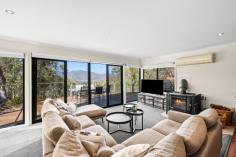 130 Mountain Bay Drive Mountain Bay VIC 3723 $950,000 - $1,030,000 Set in a peaceful, elevated position and designed to embrace its breathtaking surrounds, this architecturally appealing four bedroom, two bathroom residence captures sweeping lake and mountain views from multiple vantage points. The expansive upstairs master retreat is a true sanctuary, complete with a private Juliet balcony and oversized windows that frame the water below and leafy treetops beyond - an idyllic space to wake with the changing light and unwind in total privacy. Downstairs, light filled open plan living, kitchen, and dining areas flow seamlessly to a generous entertaining deck where mornings begin with birdsong and a quiet cuppa, and evenings are spent soaking in the tranquil outlook. A second living zone provides flexibility for families, guests, or a dedicated retreat for children, enhancing the home's functionality for both holidaymakers and permanent residents alike. Outdoors, a second rear deck is nestled among established ornamental trees, with meandering garden paths inviting you to explore the landscaped surrounds. A separate vegetable garden offers the opportunity for sustainable living, while boating enthusiasts will appreciate the convenience of being just minutes from a private launch, only 1km to the Mountain Bay members only concrete boat ramp with deep water access and no crowds. Perfectly positioned just 5 minutes from Goughs Bay, 20 minutes to Mansfield, and 40 minutes to the Mt Buller Resort entry, this exceptional property delivers the ultimate lifestyle - whether as a serene holiday escape or a full time home immersed in nature. Features You'll Love: Upstairs master retreat offering private living space, with the 4th bedroom as a flexible option Open plan living, kitchen, and dining area flowing seamlessly to outdoor entertaining decks Dedicated laundry with outdoor access from the kitchen, providing extra storage Second living area ideal for children, guests, or a quiet retreat Split system heating and cooling to both upstairs and downstairs zones for year round comfort Wood heater for cosy winter warmth Ceiling fans throughout to enhance airflow and comfort Beautifully established gardens with ornamental plantings and meandering pathways Separate vegetable garden with storage shed for sustainable living Four large water tanks providing excellent water storage capacity Option to purchase fully furnished for a ready to enjoy move in or holiday rental Just minutes from private lake access and 5 minutes to the Goughs Bay Boat Club Close proximity to Mansfield and just 30 minutes to Mt Buller Resort entry Don't miss this rare opportunity to secure your own lakeside sanctuary - whether as a tree change, holiday escape, or high yield rental.