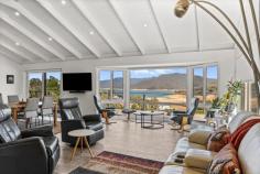 69 Harbour Line Drive Goughs Bay VIC 3723 $1,200,000 - $1,260,000 Perched in the heart of Goughs Bay, this beautifully renovated Hamptons style home sits on an extraordinary 2,209m² block, offering sweeping lake and mountain views - Imagine the spectacle if the lake were full! The block presents a rare opportunity for subdivision (STCA), with expansive flat areas perfect for boats, cars, and trailers. Designed for entertaining and comfortable living, the home features bright open-plan living and dining, with a chef's kitchen that's a showstopper. The kitchen boasts Caesarstone benchtops, large gas cooktop, deep drawers, and an oversized breakfast bar, while quality finishes continue throughout with double glazing, solar system, ducted air-conditioning, a Euro fireplace, merbau decking, and remote controlled zip track blinds. Outside, there's massive high span undercover storage for large boats, plus additional sheds and carports on the high side. A covered entertaining area overlooks a flat, fully fenced yard ideal for kids or pets, while a spacious front deck is the perfect spot to soak in the stunning vistas. The master suite is a private retreat with large bay windows, complemented by tastefully renovated ensuite and main bathrooms. Just 15 minutes from Mansfield and within reach of ski fields, Goughs Bay offers the perfect lakeside lifestyle, with the local Boat Club ideal for a seafood platter or Friday night drinks. Features You'll Love: Stunning Hamptons style home with panoramic lake and mountain views Extraordinary 2,209m² block with opportunity for subdivision (STCA) Numerous flat areas for boats, cars, and trailers Massive high span undercover storage plus additional sheds and carports Bright open plan living, dining, and chef's kitchen with gas cooktop Caesarstone benchtops, deep drawers, and oversized breakfast bar Master suite retreat with bay windows & deck access Double glazed windows & doors throughout Solar system for energy efficiency Ducted air conditioning and Euro fireplace Tastefully renovated main and ensuite bathrooms Merbau decking front and back with remote controlled zip track blinds at rear Covered entertaining area overlooking fully fenced yard - ideal for kids or pets Front deck perfect for relaxing and enjoying lake views Prime Goughs Bay location, 15 mins from Mansfield and 40 mins to Mt Buller Boat Club nearby for seafood platters and Friday night drinks More than a home - it's a lifestyle of luxury, entertaining, and breathtaking lakeside views.