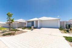 27 Modernism Ave Alkimos WA 6038 $950,000 Welcome to 27 Modernism Avenue, Alkimos – a beautifully crafted 2025 build by New Choice Homes that perfectly blends sophistication, comfort, and contemporary design. This premier residence is finished with all the bells and whistles, offering a tranquil lifestyle with high-end features throughout. Step inside and be greeted by soaring 28-course ceilings and expansive 600x600 tiling that enhances the sense of space and light within the main living areas. The thoughtfully designed floorplan delivers both functionality and style, making it ideal for everyday living and effortless entertaining. The king-sized master suite is a true retreat, featuring stunning picture windows that invite natural light and outdoor scenery indoors, creating a serene and relaxing atmosphere. Complete with a walk-in robe and a sleek, modern ensuite with glass shower, this space offers the ultimate in comfort. A spacious theatre room provides the perfect setting for movie nights or quiet relaxation, while the separate minor bedroom wing includes three generously sized bedrooms, all fitted with built-in robes and soft carpeting. These are serviced by a contemporary family bathroom, offering privacy and convenience for the whole family. At the heart of the home lies a stunning open-plan living, dining, and kitchen area, framed by walls of windows that flood the space with natural light. The designer kitchen features a central island with engineered stone benchtops, a 900mm oven with 5-burner gas cooktop, dishwasher and microwave recesses, and a well-appointed pantry. The adjoining laundry offers additional storage with linen shelving and matching stone benchtops, ensuring practicality meets style throughout. Seamlessly extending from the living area, the spacious lounge opens onto a covered alfresco, perfect for entertaining or unwinding, all overlooking a neat and low-maintenance garden. Features include (but are not limited to): • Double garage with shopper's entry • 28c high ceilings throughout • Reverse-cycle ducted and zoned air conditioning • Instantaneous hot water system • Quality finishes and modern design throughout • Solar- 14 panels with a 5kw inverter ( install date 31st July 2026) Investor Highlights: • Block size: 426m² • House size: 180m² • Estimated rental return: $700 – $730 per week
