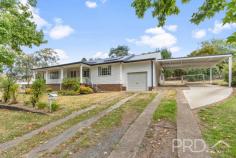 47-49 Gundagai Street Adelong NSW 2729 $599,000 Set on a generous corner allotment, with a charming street presence and established tranquil surrounds, you will love calling this extremely well maintained and versatile residence home. Having been tightly held for over 26 years, this high-set family home offers multiple indoor living options, fully covered and very private outdoor entertaining, renovated kitchen and ample space for the growing family. Do not miss your opportunity to secure this three-bedroom family home in the heart of Adelong. Call today to book your inspection. Premiere Features: - Three privately positioned bedrooms, all offering ducted cooling and two with built in robes - Centrally located bathroom with separate shower, bath and single vanity with storage - Tastefully renovated kitchen with stainless appliances and timber benchtops, offering ample storage and bench space options - Formal lounge to the rear of the plan with direct external access and serviced by wood box fire, reverse cycle air conditioner and ducted evaporative cooling - Large living and dining area with direct access to the front deck and ducted evaporative cooling - External laundry - Linen cupboard in hallway - Separate toilet - Large fully covered private entertaining area to the rear with lighting and power - Great sized front verandah - Single lock up garage with PA access to rear entertaining - Double carport off the side of the home with direct vehicle access to the rear yard - Fully fenced rear yard - Additional vehicle access to the rear yard off Neill Street - Rainwater tank - Approximate 1,173m² allotment - Opposite Adelong Memorial Park and Tennis Court