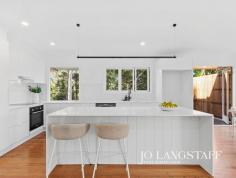 31 Mabb Street Kenmore QLD 4069 Comprehensively renovated for modern family living, the home combines the quality and character of its early 1970s brick and tile construction with a long list of thoughtful upgrades throughout. From the brand new kitchen and beautifully finished bathrooms to restored hardwood floors and carefully selected fixtures and fittings, every element has been updated with a clear eye for quality, timeless design and the details that make everyday family life easier. Positioned on the 632sqm block to capture a prized northern rear aspect with no neighbours behind, it opens to uninterrupted greenery - creating a rare sense of privacy and calm. On the entry level, daily life naturally centres around the living, dining and kitchen spaces, where restored hardwood floors bring warmth and the elevated deck draws the outdoors in. From here, the outlook across the lawn and established trees beyond the rear boundary gives the home a wonderful sense of space and openness. Four generous bedrooms are spread across two levels and supported by three beautifully appointed bathrooms and multiple living areas, allowing families to come together or spread out with ease. Downstairs, the large family room opens directly to the patio and backyard - perfect for teenagers, guests or relaxed weekends at home - while the extensive undercroft storage adds the kind of practical flexibility that families quickly come to appreciate. Within catchment for Kenmore State School and Kenmore State High School, walking distance to public transport and just minutes to Kenmore Village, the location makes daily life exceptionally easy - with a walking path and open green space directly beyond the rear boundary reinforcing the appeal of this tightly held pocket. Renovations of this standard are few and far between. This is guaranteed to sell at auction if not before so do not hesitate to view as soon as possible. INSIDE THE HOUSE: Solid early 1970s brick and tile construction, comprehensively renovated; Restored original hardwood floors to living areas with soft water-based finish; Brand new kitchen with Bosch appliances, stone benchtops, large island, soft-close cabinetry & Fienza tapware; Entry-level living / dining flowing directly to elevated hardwood deck; Master suite with custom walk-in robe & refined ensuite with full-height tiling; Second upstairs bedroom with triple aspect, ceiling fan & adjoining study nook; Family bathroom with custom cabinetry, designer tiling & soaking tub; Two generous downstairs bedrooms plus newly tiled family room opening to patio; Third fully renovated bathroom on lower level; Split-system air conditioning to living, master & downstairs zones; Separate laundry with stone benchtop, custom cabinetry & external access; Restored original windows with new hardware; Extensive lockable undercroft - ideal storage, workshop or future flexibility; Double garage. OUTSIDE THE HOUSE: 632sqm block with prized northern rear aspect; Elevated hardwood deck overlooking immaculate lawn & uninterrupted greenery; Fully fenced backyard - ideal for children & pets; Exceptional new landscaping to front & side; Hardwood fencing and deck construction; Walking path and open green space directly beyond rear boundary; Newly painted roof. THE LOCATION: Within catchment for both Kenmore State High School - an easy, very short walk - and Kenmore State School (approx. 4 minute drive); Approx. 15-20 minute drive to leading private schools including BBC, St Peters, Brigidine & Ambrose Treacy College; Approx. 1.2km to Kenmore Village - around a 3 minute drive or 15 minute walk (Coles, Mitre 10, BCC Library & specialty stores); Bus stop within approx. 5-7 minute walk with services to Indooroopilly Shopping Centre & Brisbane CBD; Additional bus routes available from Kenmore Village.