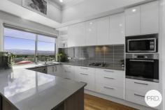 16A Clermont Crescent Albion Park NSW 2527 $975,000 - $1,025,000 Commanding an elevated position and capturing breathtaking escarpment views, this impressive 4 bedroom home delivers a lifestyle of space, comfort and unforgettable entertaining. Designed to embrace its stunning surroundings the home features a show stopping entertainment area with sweeping 180 degree views, an incredible setting for hosting guests or simply relaxing while taking in the ever changing landscape. The kitchen, also overlooking the view, combines practicality with style, featuring stone benchtops, gas cooking and a dishwasher, all perfectly positioned to service both the living and entertaining areas. The adjoining light filled living space also enjoys the spectacular outlook, creating a seamless connection between indoor comfort and the surrounding scenery. With four oversized bedrooms designed for family living. The master suite offers its own private ensuite, providing a peaceful retreat away from the rest of the home. Completing the package is a double garage with additional storage, under house storage and a backyard for kids and pets to enjoy. This is a home that perfectly balances elevated views, exceptional entertaining and family friendly living. FEATURES YOU WILL LOVE Elevated position with stunning escarpment views Show-stopping entertaining area with 180° panoramic outlook Kitchen with stone benchtops, gas cooking & dishwasher Light-filled living area capturing the views Four oversized bedrooms Master suite with private ensuite Double garage with extra storage Backyard perfect for kids and pets Additional storage space under the home
