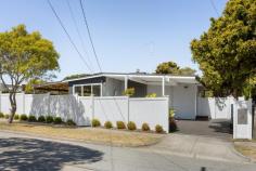 11 Stradbroke Avenue Frankston South VIC 3199 $1,250,000 - $1,375,000 Thoughtfully and fully renovated to create a seamless connection between indoor and outdoor living, this exquisite family home delivers a modern, elevated interpretation of bayside living in one of Frankston's most sought-after pockets. Privately set behind a front fence with electric gate, it balances beautifully proportioned rooms with intuitive flow, where sunlight fills each space and Tasmanian Oak floors add warmth and refinement throughout. Lush, resort-style gardens provide an impressive welcome, unfolding to a carefully resolved interior that effortlessly balances entertainer and retreat. Versatile living and dining zones are enhanced by vaulted ceilings and refined, top-tier finishes. With a gentle push, bi-fold doors open to create effortless indoor-outdoor entertaining, extending the open-plan living area to connect the front and rear gardens, all set on approximately 601sqm with ample room for a pool (STCA). Engineered stone surfaces, expansive glazing and soft-close cabinetry define the standout kitchen, showcasing premium appointments including a Westinghouse 900mm underbench oven and gas cooktop, Oliveri tapware, and a butler's pantry designed for both functionality and entertaining. The main bedroom is bathed in brilliant morning light and features a privately accessed deck, walk-in robe and twin-vanity ensuite with double shower and heated towel rail. Three additional bedrooms, all filled with natural light and finished with solid timber floors underfoot, surround a matching central bathroom with feature bath. Additional highlights include a gas log fireplace, split-system heating and cooling, a 12.7kW solar system, instantaneous hot water, extensive double glazing for enhanced comfort and efficiency, built-in joinery, a separate home office, a generously sized garden shed, and secure parking. Positioned within both the Overport Primary and Frankston High School Zones, and moments from Sweetwater Creek, Delacombe Park, Frankston Foreshore, Foote Street and Norman Avenue cafés, Bayside Shopping Centre and Frankston Hospital, this is a lifestyle address where demand remains consistently strong.