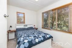 16 Pether Street Talbingo NSW 2720 You will love the simplicity of this well established two bedroom high-set cottage in the heart of the picturesque township of Talbingo. Boasting two bedrooms, centrally located bathroom and large open plan living, that flows seamlessly into the eat in style kitchen. With additional study area and wrap around timber deck, perfect to take in the surrounding hills. 16 Pether Street is a short stroll to all major amenities and Joumana Dam. Do not miss your opportunity to secure this cottage style home in the heart of town. Call today to book your inspection. Premiere Features: - Two good sized bedrooms, both with built in robes and casement windows - Centrally located bathroom with shower, single vanity, shaving cabinet and toilet - Large eat in style kitchen with ample bench space and cabinetry, boasting electric cooktop - Great size living area directly off the kitchen, overlooking the rear deck and serviced by wood box fire and ceiling fan and also boasting triple built in robes for extra storage options - Additional study area and combined laundry at the rear of the home and direct external access to the deck - Fully covered rear entertaining area with mod wood timber deck wrapping around two sides of the home - Double lock up shedding with PA access - Approximate 695m2 allotment - Fully fenced yard - Short stroll to all major local amenities, including the Talbingo golf club and Jounama Dam Do not miss your opportunity to secure this high-set two bedroom cottage in the heart of Talbingo!