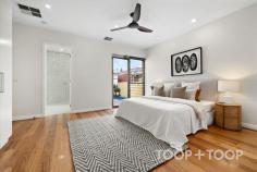25 Jetty St Grange SA 5022 At 25 Jetty Street, Grange, everyday life is shaped by proximity to the water—walking distance to the stunning shoreline of Grange Beach, and equally close to local cafes and eateries. Architecturally designed c.2010 and set on a north-facing 560sqm allotment, this four-bedroom residence is planned around light, comfort, and a strong connection between interior living zones and a deliberately low-maintenance outdoors. The home’s pool setting is central to its lifestyle appeal: a solar-heated inground swimming pool is paired with a cabana, decked leisure area, and outdoor shower, creating an outdoor arrangement that reads as purposeful and easy to use. A spacious alfresco extends the entertaining footprint further, featuring an outdoor barbeque area and an automatic outdoor blind—practical inclusions that make the space adaptable across changing weather and long lunches that run into the evening. Inside, the kitchen continues the home’s emphasis on function and finish, with Smeg appliances anchoring the main cooking zone. Warm timber floors and expansive glass doors seamlessly connect the open-plan living and dining areas to the outdoor spaces. A work from home office or luxe guest bedroom adds flexibility on the ground floor, complemented by a cosy gas fireplace set into a stone feature wall—an inviting focal point for quieter months or visiting friends. Also on the ground level, the master bedroom is positioned as a true retreat: built-in robes, a modern ensuite, with poolside views and direct access for morning swims or easy outdoor living. A wine cellar adds a considered touch for collectors and entertainers alike, while a powder room and laundry on this level support day-to-day flow without complication. Upstairs, a large living area offers a second zone for relaxation, with discreet kitchen facilities that make it ideal for shared living arrangements or guests. Two generous bedrooms with built-in robes are supported by a bathroom and an additional powder room, reinforcing the home’s practical planning. Features we love • Architecturally designed c.2010 four-bedroom home on a north-facing 560sqm allotment • Solar-heated inground pool with cabana, decked leisure area, and outdoor shower • Spacious alfresco with outdoor Weber kitchen and automatic outdoor blind • Lounge/guest bedroom with gas fireplace and stone feature wall • Ground-floor master with modern ensuite, built-in robes, and poolside access • Double garaging with internal home access and built in shelving • Ducted reverse cycle air conditioning, plus evaporative cooling • Environmentally conscience with 5.5kw solar panels and 13,500ltr underground water tank plumbed to toilets and garden irrigation system • Large upper-level living area with kitchenette Location Highlights Lifestyle and Convenience Just footsteps from the sands of Grange Beach, the Grange Hotel, Jetty and iconic Jetty Café with a plethora of local cafes and amenities within an easy walk. Education Zoned for Grange Primary and Seaton High School with additional schooling options including, Star of the Sea, Fulham Gardens Primary, Fulham North Primary, Elizabeth O’Grady Kindergarten, St. Michael’s College, and more.