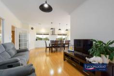 2045 Alice Rd Mount Helena WA 6082 $1,000,000 This Mount Helena home was designed according to the principles of Maharishi Sthapatya Veda – a 5,000-year-old architectural science that aligns a building’s orientation, room placement and proportions with the rhythms of the natural world. You don’t need to be a devotee to appreciate the outcome: a house that is exceptionally well-considered, filled with natural light and quietly easy to live in. 5 bedrooms, 2 bathrooms 2017-built Brick and C/bond Impeccable proportions Multiple living spaces Vast eat-in cook’s kitchen Media room, study, studio Tank, solar, Colorbond shed 2-car garage adjoining gym 5-acre fenced and gated lot Beautifully presented Some homes just feel right. The light is better, the rooms make sense, the day seems to move more easily within them. The east-facing aspect of this elevated home brings unobstructed sunrise views from the wide verandahs and principal rooms. The neutral palette, the restrained material selection, the solid bamboo flooring that runs across most of the plan: all of it produces interiors that are simultaneously energising and calm. At the centre of the plan is a generous family room anchored by a Brahmasthan – a point drawn from Vedic tradition and said to channel positive energy through the home. This is a room – a house – that feels good to be in. The eat-in kitchen is an excellent space – long benchtops, deep storage drawers, fitted cabinetry, a 900 mm oven, an induction cooktop, a dishwasher, and two pantries. East and west windows frame treetop views and keep the room bright throughout the day. A large laundry with built-in storage and a separate WC sits just off the kitchen, practical and well-resolved. The principal suite offers dual-aspect glazing, a large fitted walk-in robe, and an ensuite with a double vanity, shower, and WC. The remaining bedrooms each have fitted robes and good windows; they share a family bathroom with a shower, a tub, and a double vanity, plus a separate powder room. Across the eastern face of the home, a series of multi-purpose rooms speaks to the reality of contemporary family life. A dedicated media room opens onto a home office with direct access to the verandah. A formal sitting room and adjoining studio with dual-aspect glazing complete the picture – adaptable to whoever calls this home and however their needs evolve. Ten-zone ducted air conditioning and a slow-combustion fireplace manage the climate year-round. Outside, the 5-acre lot is fenced, gated and quietly productive. A 135,000-litre rainwater tank supplies the house and feeds reticulation, including a small orchard planted with mango, guava, pineapple and mandarin. A Colorbond workshop sits separately from the remote-entry double garage and its adjoining gym. The infrastructure is in place; the country lifestyle is ready to begin. The location adds further appeal. Mount Helena Primary School is moments away, Eastern Hills Senior High School serves the older years, and the Steiner Schools in nearby Parkerville offer further options – a notably rare convenience in a semi-rural setting. Mundaring’s shops, cafés and services are around 15 minutes away, Midland around 20, Perth Airport around 30 minutes in the other direction, and the Perth CBD within approximately 40 minutes. Close enough to access everything, far enough to leave it all behind.