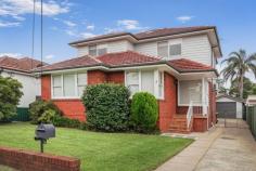 3 Sandra Crescent Roselands NSW 2196 $1,879,950 Positioned in a whisper-quiet, family-friendly cul-de-sac, 3 Sandra Crescent, Roselands delivers exceptional space, flexibility and convenience on a generous 607sqm parcel of land with a wide 13.4 metre frontage. Located just moments from Roselands Shopping Centre, quality local schools and everything Beverly Hills has to offer, the home also enjoys easy access to King Georges Road, the M5 and M8, ensuring effortless connectivity in every direction. Set across two expansive levels, this substantial residence has been thoughtfully designed to accommodate large or multi-generational families, while also presenting excellent investment and future value-addition. On the ground floor, you are welcomed by an open plan living and dining area, framed by a central staircase leading upstairs. Flowing directly from this living/dining zone is another family/lounge room at the rear of the home, which intertwines seamlessly with the living and dining space and provides direct access to the kitchen & backyard. To the left upon entry, you will find a dedicated home office, followed by a generous enclosed rumpus room, then a sixth bedroom, offering incredible flexibility for growing families or those needing additional accommodation or work-from-home. The kitchen is beautifully appointed with 20mm stone benchtops and sits centrally to service both the main living areas. Also on the lower level is a full main bathroom complete with shower and bathtub, ample storage throughout, and a separate laundry with an additional toilet for added convenience. Step outside to a manicured, level backyard featuring lush grass and a covered barbecue area, ideal for hosting family gatherings. The lock-up garage offers drive-through access from the front to the rear, making it perfect for trailers, trucks, jet skis or additional vehicles. With its wide 13.4 metre frontage and substantial 607sqm block, the property also presents exciting potential for a granny flat or swimming pool, subject to council approval. Upstairs, the accommodation continues with five generously sized bedrooms, all fitted with built-in wardrobes. An updated main bathroom featuring a double basin, shower and separate toilet comfortably services the upper level, ensuring practicality for larger households. Much loved & well maintained, this property is ready to move into or lease out. This charming family home offers immediate space with long-term potential. Whether you are seeking room for a large family or an investment with further potential, this is an opportunity not to be missed.