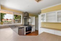 4 York Court Frankston VIC 3199 $830,000 - $850,000 Located mere moments from Karingal Primary School and Ballam Park, this treasured three-bedroom home reflects the joy of many summers past and opens the door to a bright array of future possibilities. Set on a prime 942sqm (approx.) enhanced by established greenery, it provides potential for renovation while remaining comfortable as is, in a location that has been a favourite among families through the years. A treasured interior accented by hardwood floors encapsulates the enchanting essence of yesteryear, with a thoughtfully designed layout opening throughout a designated social hub. Anchored to the rear by a generous kitchen equipped with a stainless steel splashback and dual-fuel cooker, entertaining is made effortless by abundant preparation space. An accommodation spine conceals four spacious bedrooms and two practical bathrooms, including a master bedroom with dual-accessed ensuite. Gas ducted heating and evaporative cooling maintains a comfortable climate year-round, while a sun-kissed patio, secure rear yard, exterior shedding, and ample off-street parking meets all practical needs. Perfect for the enthusiastic tradesman or savvy investor, the home sits within easy reach of Karingal Hub, Peninsula Kingswood Country Golf Club, Ballam Park Primary School and Peninsula Link access.