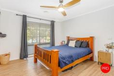12 Kilby Court Kangaroo Flat VIC 3555 $720,000 - $750,000 Set in a quiet court location in popular Kangaroo Flat, 12 Kilby Court offers the space, practicality and lifestyle flexibility families are searching for. Positioned on a generous 1,092sqm allotment, this well-presented 4-bedroom, 2-bathroom home combines comfortable everyday living with excellent outdoor space, established gardens and fantastic shedding. The home presents a welcoming street presence, featuring classic brick construction, a green roofline and landscaped front gardens. Inside, the layout is practical and family-friendly, with a light-filled kitchen, dining and living zone forming the heart of the home. The kitchen offers excellent bench space, modern cabinetry, quality appliances and easy connection through to the main living areas. Thoughtfully updated with wheelchair accessibility in mind, the home also incorporates a range of modern modifications designed to better accommodate wheelchair users, enhancing both comfort and ease of movement throughout the residence. The dining space enjoys a pleasant outlook to the front garden, while the adjoining living area provides room for relaxed family living. Accommodation includes four bedrooms, supported by two bathrooms, making the home well-suited to growing families, guests or those needing a dedicated work-from-home space. The accessible design elements further add to the home's versatility, creating a property that can comfortably cater to a wide range of lifestyle needs both now and into the future. Outside is where the property really adds value. The large block provides excellent yard space, room for children, pets, gardening, or future improvements, while the shedding adds genuine versatility. The property includes two sheds, with one currently set up as a gym or fitness space, and a larger powered shed ideal for trades, storage, hobbies, workshop use or additional secure parking. Located close to Kangaroo Flat amenities, schools, parks and local conveniences, this is a property that delivers size, comfort, functionality and lifestyle flexibility in a tightly held residential pocket.