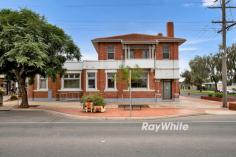 101 Commercial Street Merbein VIC 3505 $1,050,000 - $1,150,000 One of the most majestic buildings in Merbein has been restored to it's former glory. Extensively renovated, yet keeping the rich history of the former State Savings Bank of Victoria building. Commercial 1 zoned property, with a five bedroom residence upstairs. Approximately 216m2 ground floor area and 106m2 first floor area. The ground floor offers large open area, office, storage room, staff toilet facilities, along with lounge, laundry & brand new kitchen. The first floor provides the five bedrooms, along with bathroom plus toilet with powder room. The main two bedrooms also have a balcony, along with the master with built-in-robes and open fireplace. With the potential to use the ground for commercial and the first floor as accommodation, such as Airbnb or backpackers (STCA). Corner allotment of 664m2, being a 20.1 metre frontage by 33 metre depth. Electric gate access to the rear yard. Located on Merbein's main street and opposite Ritchies supermarket, there is ample on-street parking. With absolutely nothing needed to do but move in, utilise for your commercial or residential needs.