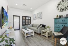 6 / 73-75 Lake Entrance Road Oak Flats NSW 2529 $900,000 - $930,000 A striking expression of contemporary design, this stunning townhouse delivers a refined lifestyle of light, space and understated luxury. Privately set the home unfolds with a sense of calm sophistication, where every detail has been carefully curated for modern living. Bathed in natural light, the interiors reveal a timeless palette of crisp whites, soft textures and natural finishes. Thoughtfully designed to balance connection and retreat with expansive glass stacker doors dissolve the boundary between indoors and out. At its heart, a beautifully appointed open plan living and dining domain extends seamlessly to a sun drenched alfresco an inviting setting for long lunches, evening entertaining, or quiet moments of relaxation. Positioned for lifestyle convenience, enjoy a short stroll to Oak Flats Village and Bowling Club, with the sparkling shores of Lake Illawarra and its scenic foreshore cycleway less than 1km from your door. Shellharbour's vibrant retail and dining precinct is just minutes away. HIGHLIGHTS • Light filled open plan living and dining framed by high ceilings • Seamless indoor outdoor integration via full width glass stacker doors • Designer kitchen showcasing stone benchtops, matte black finishes and gas cooking • Ground level powder room and well appointed laundry • Three generously proportioned bedrooms with mirrored built in robes • Master suite complete with private ensuite • Sophisticated main bathroom featuring freestanding soaking tub and separate shower • Secure double garage with remote access and internal entry • Ducted air-conditioning • Plantation shutters • Louvered alfresco area allowing for natual light and sunlight or closed for protection from the rain • Fully fenced and private Surrounded by quality schools including Balarang Public School, Oak Flats High School, and TAFE Shellharbour, this residence presents a rare opportunity to secure a home where architectural finesse meets everyday ease.