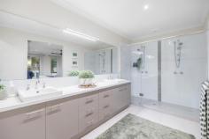 2 Bronzewing Court Langwarrin VIC 3910 $1,690,000 - $1,850,000 Positioned within a peaceful pocket of Langwarrin, this extensively renovated residence delivers spacious family living with the added advantage of a fully self-contained attached unit, creating exceptional flexibility for extended family, guests, home business use or additional accommodation. Set on a prominent corner allotment with two separate driveways and individual entrances, the home immediately impresses with its freshly painted rendered façade, landscaped gardens, established yucca trees and manicured surrounds. Inside, a welcoming tiled entry introduces thoughtfully designed interiors enhanced by LED downlights, ducted heating and evaporative cooling throughout. The front formal lounge provides a quiet retreat with soft carpeting, sheer curtains and abundant natural light, while the expansive open-plan living and dining domain forms the heart of the home beneath vaulted ceilings and skylights. A wood-burning fireplace creates warmth and ambience, complemented by a custom built media unit with timber finishes. The renovated kitchen combines functionality with contemporary style, appointed with waterfall stone benchtops, breakfast bar seating, gold fixtures, extensive cabinetry, integrated Bosch dishwasher and premium ILVE cooking appliances including a gas cooktop, grill and oven. Privately positioned, the spacious master suite features a double-door entry, ceiling fan, walk-in wardrobe with mirrored sliding doors and a beautifully appointed ensuite complete with dual vanities and oversized double shower. Additional bedrooms within the main home include built-in robes and are serviced by a renovated central bathroom showcasing a freestanding bath, floating vanity and rainfall shower. A standout feature of the property is the attached self-contained unit with its own driveway, garage and private access. Designed for flexibility, the space includes a kitchen with induction cooking, living and dining area, split-system heating and cooling, bathroom/laundry, generous bedroom with extensive built-in robes and an additional room suitable as a study or second bedroom. Outdoor living is equally impressive with covered alfresco entertaining areas servicing both the main residence and the separate accommodation. Decking, café blinds, ceiling fans and established tropical-inspired landscaping create inviting spaces for year-round enjoyment, while additional features include AstroTurf, a water feature, water tank and storage shed. Conveniently located close to Langwarrin Flora and Fauna Reserve, Peninsula Private Hospital, Langwarrin Primary School, Elisabeth Murdoch College, Ballam Park, Lloyd Park, Frankston Golf Club, Karingal Hub, The Gateway Shopping Centre and easy access to Peninsula Link.